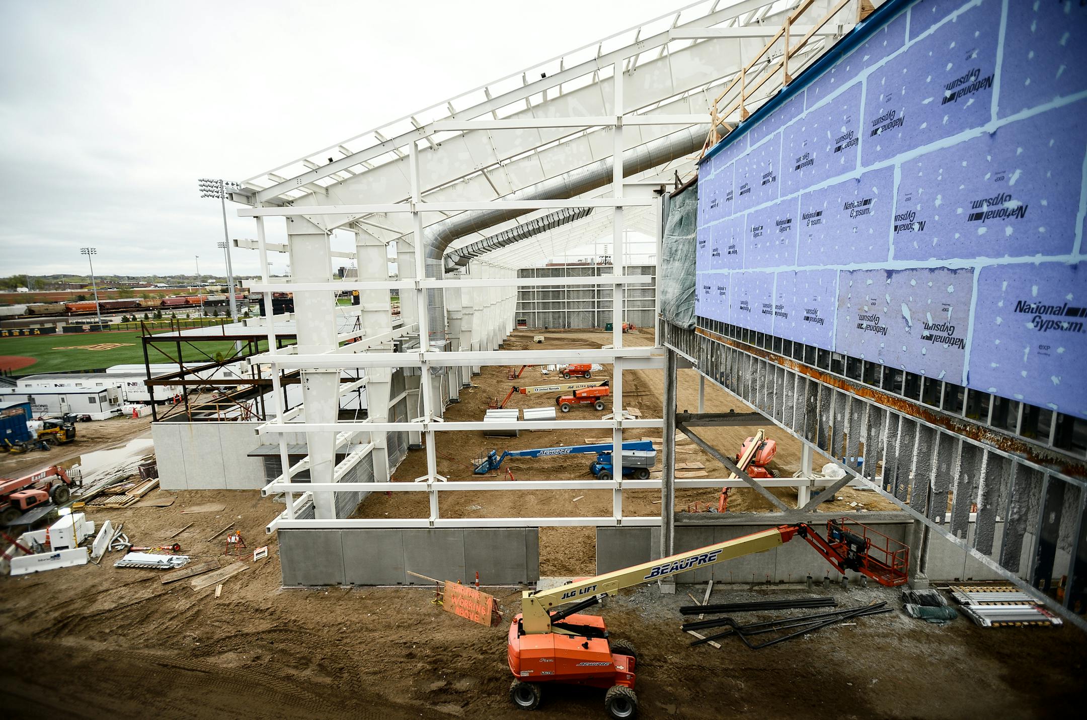 The under-construction indoor football field in the new Athletics Village. ] AARON LAVINSKY ï aaron.lavinsky@startribune.com The University of Minnesota Athletics Department and Mortenson Construction gave a media tour of the ongoing Athletes Village Construction on Thursday, April 27, 2017 in Minneapolis, Minn.