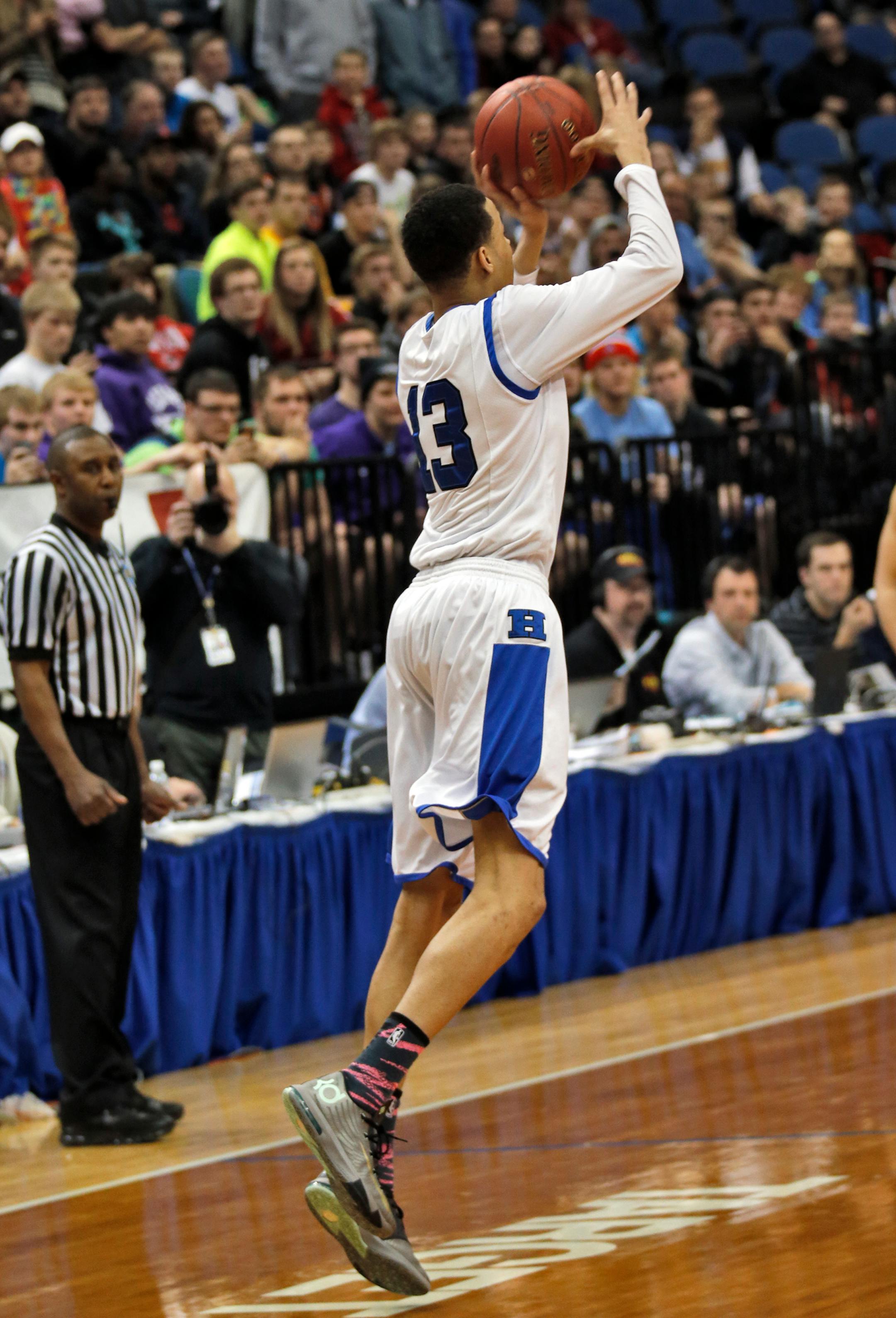 Hopkins Amir Coffey launched a shot from behind the half-court line that went in as the horn was sounding to end the fourth overtime giving Hopkins the victory. ] Class 4A Boys Basketball Tournament. Hopkins vs. Shakopee. Hopkins won in four overtimes 49-46.(MARLIN LEVISON/STARTRIBUNE(mlevison@startribune.com) ORG XMIT: MIN1403132044580677