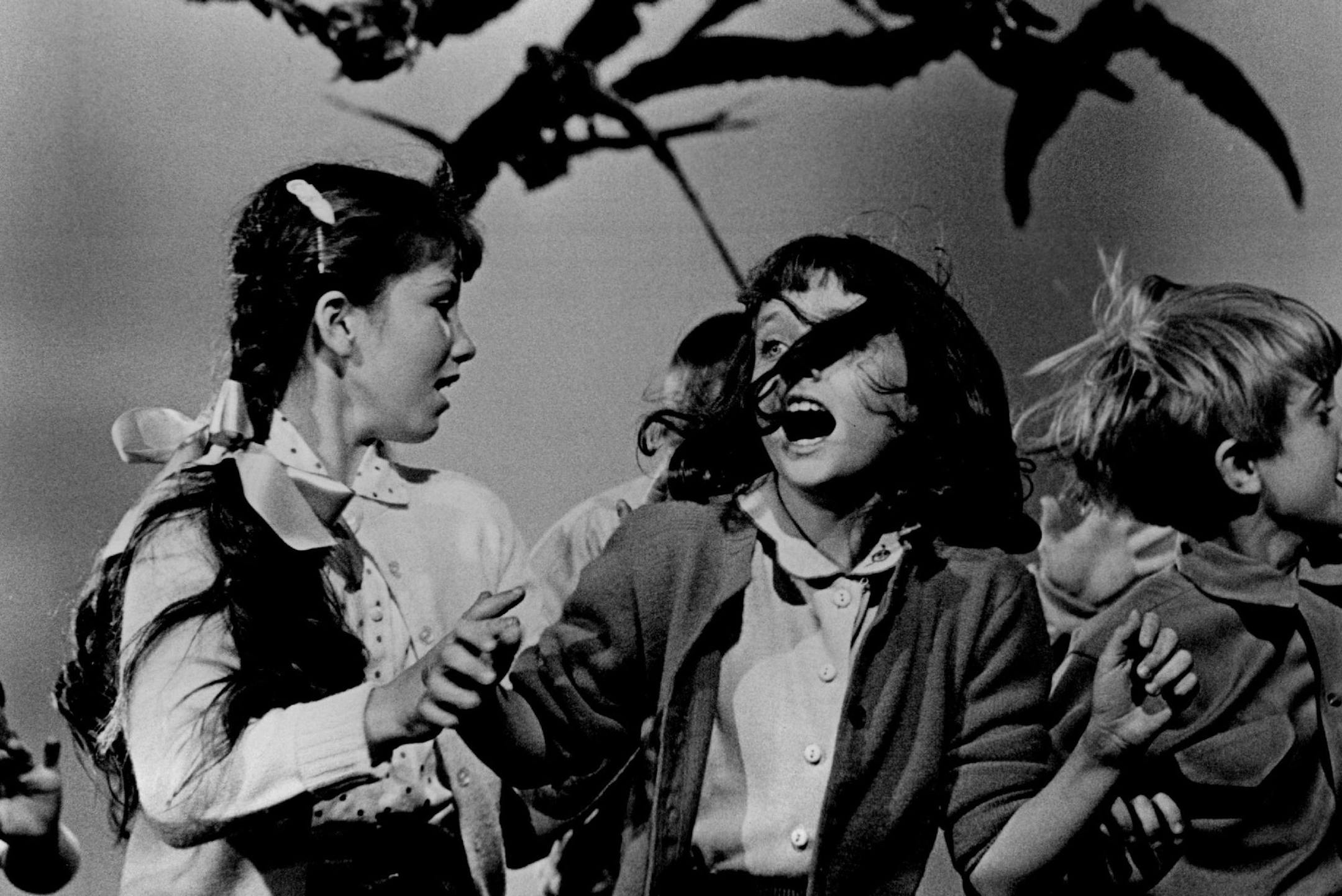 March 24, 1963 "The Birds". A Universal Release -- Birds attack children in a frightening scene from Alfred Hitchcock's "The Birds," based on the classic suspense thriller by Daphne du Maurier and starring Rod Taylor, Jessica Tandy, Suzanne Pleshette and introducing 'Tippi' Hedren. A Universal release. Universal Studio; Minneapolis Sunday Tribune