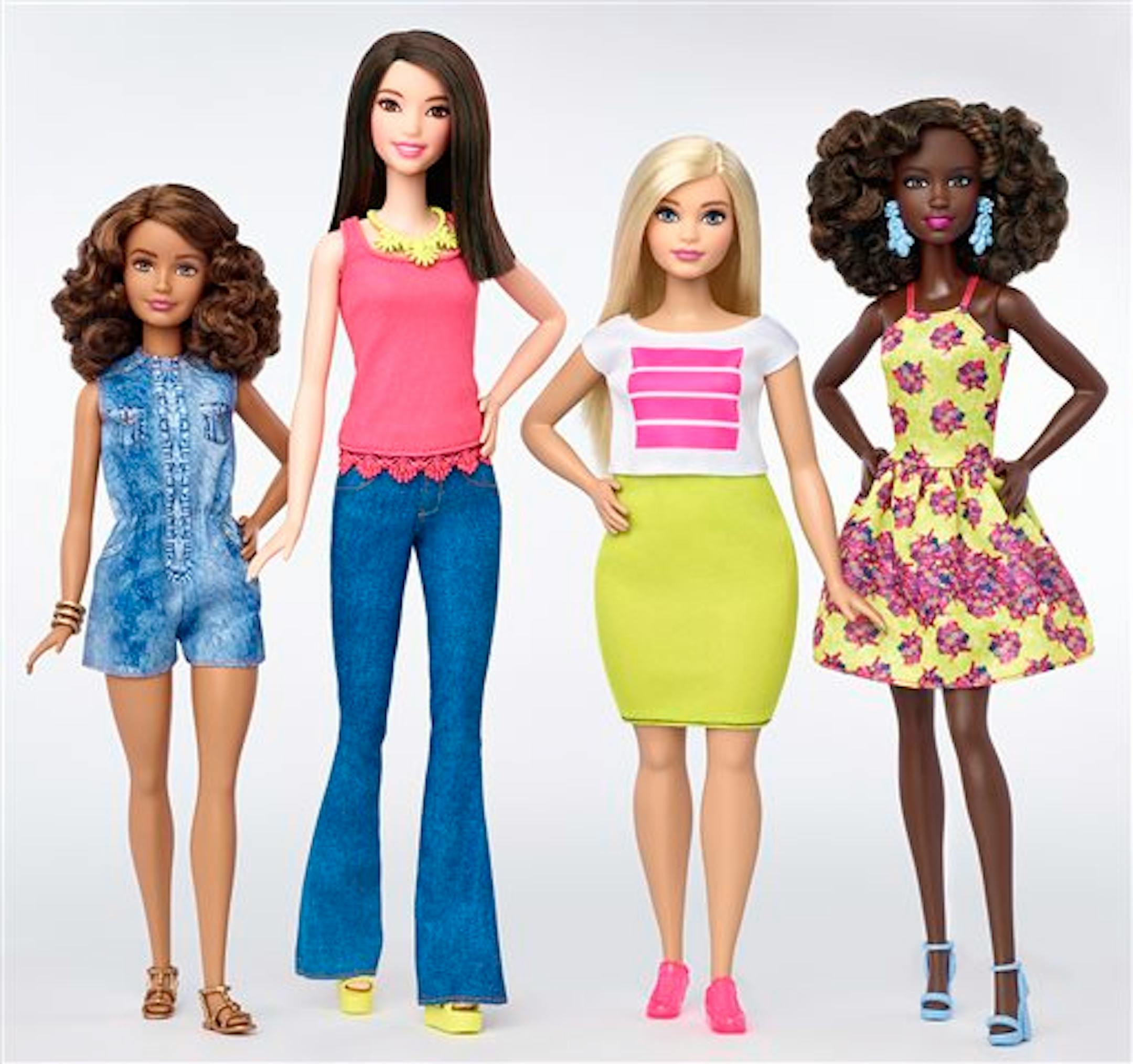 This photo provided by Mattel shows a group of new Barbie dolls introduced in January 2016. Mattel, the maker of the famous plastic doll, said it will start selling Barbie�s in three new body types: tall, curvy and petite. She�ll also come in seven skin tones, 22 eye colors and 24 hairstyles. (Mattel via AP)