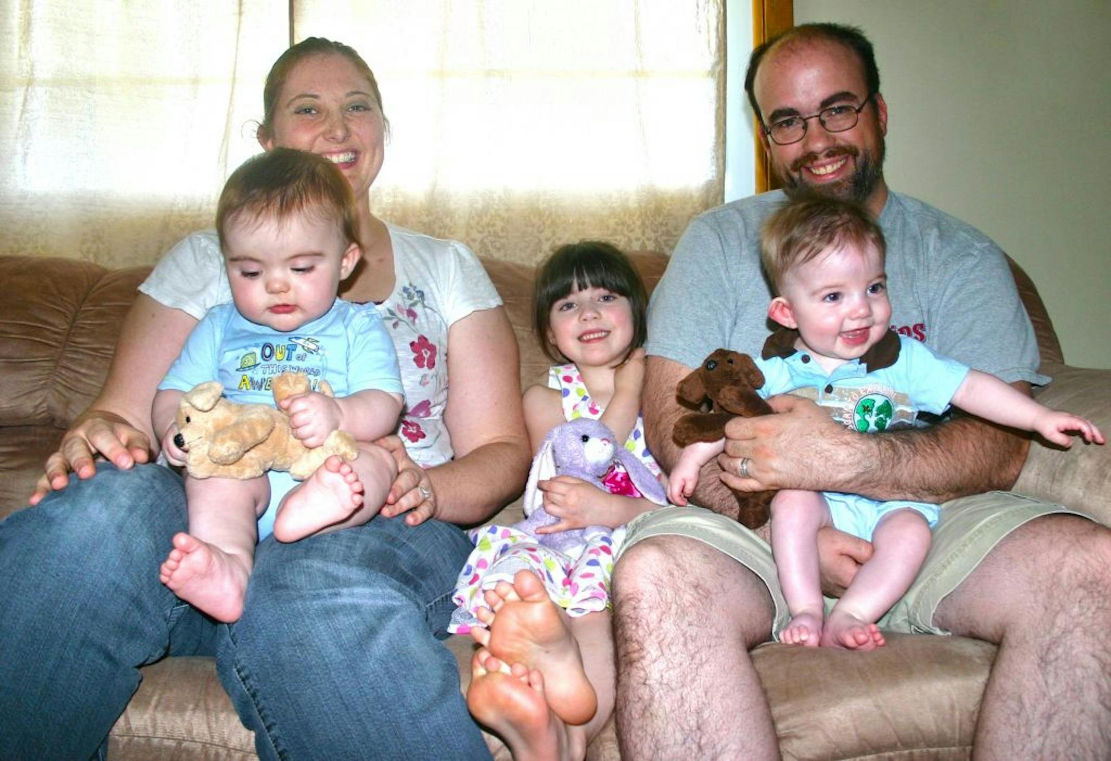 The Packard family: Nicole is holding Wolfgang, and Erik is holding Ronan, Wolfgang's twin brother. Nadira, age 5, is in the middle.