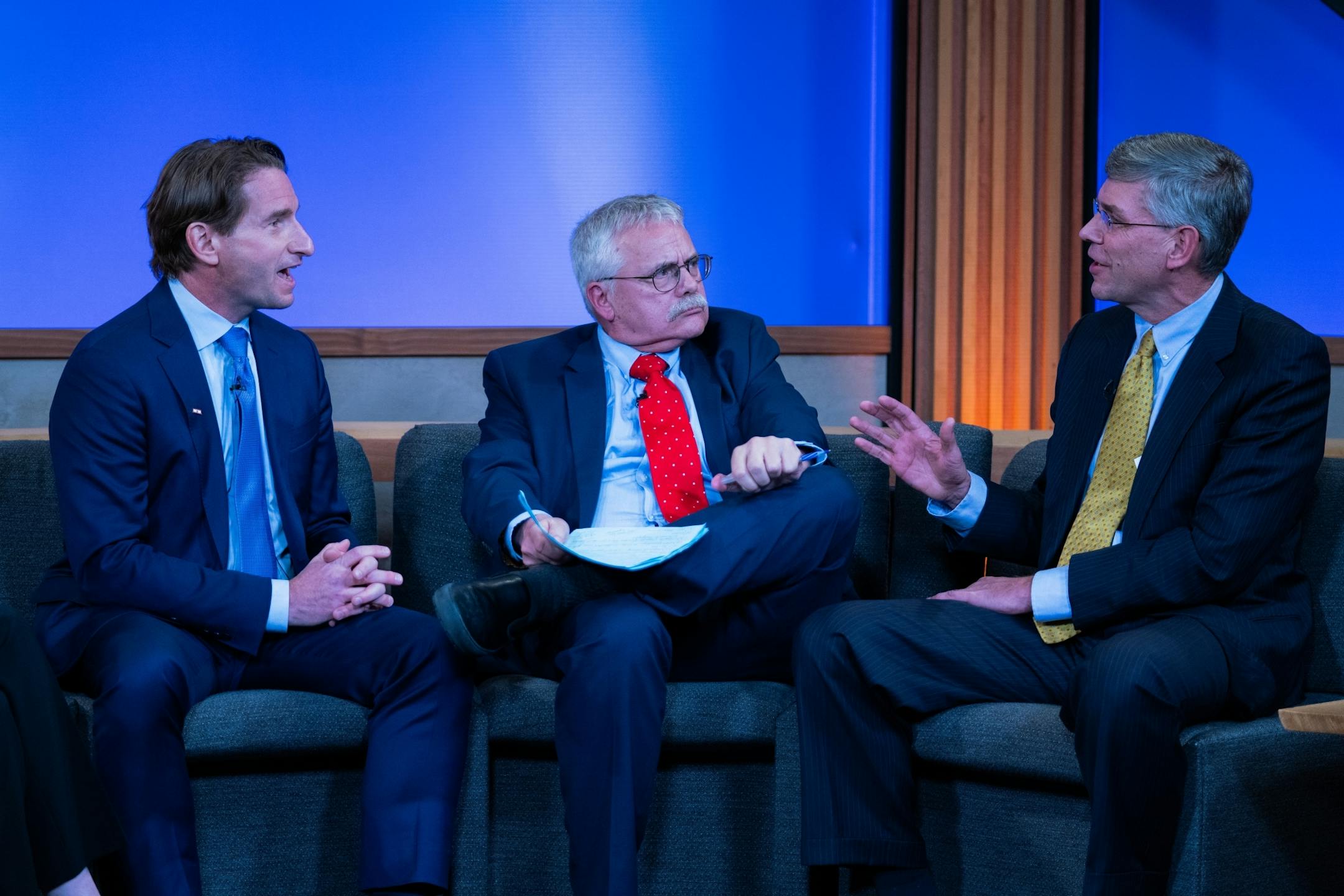 Third District challenger Dean Phillips, left, and Rep. Erik Paulsen debate on "Almanac." Co-host Eric Eskola is pictured, center.