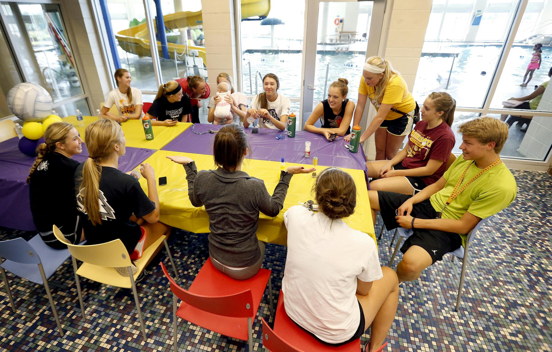 Members of the Chaska High school volleyball team met for a spaghetti dinner at the Chaska Community Center on Thursday. ] CARLOS GONZALEZ cgonzalez@startribune.com August 22, 2013, Chaska, Minn., Chaska Community Center