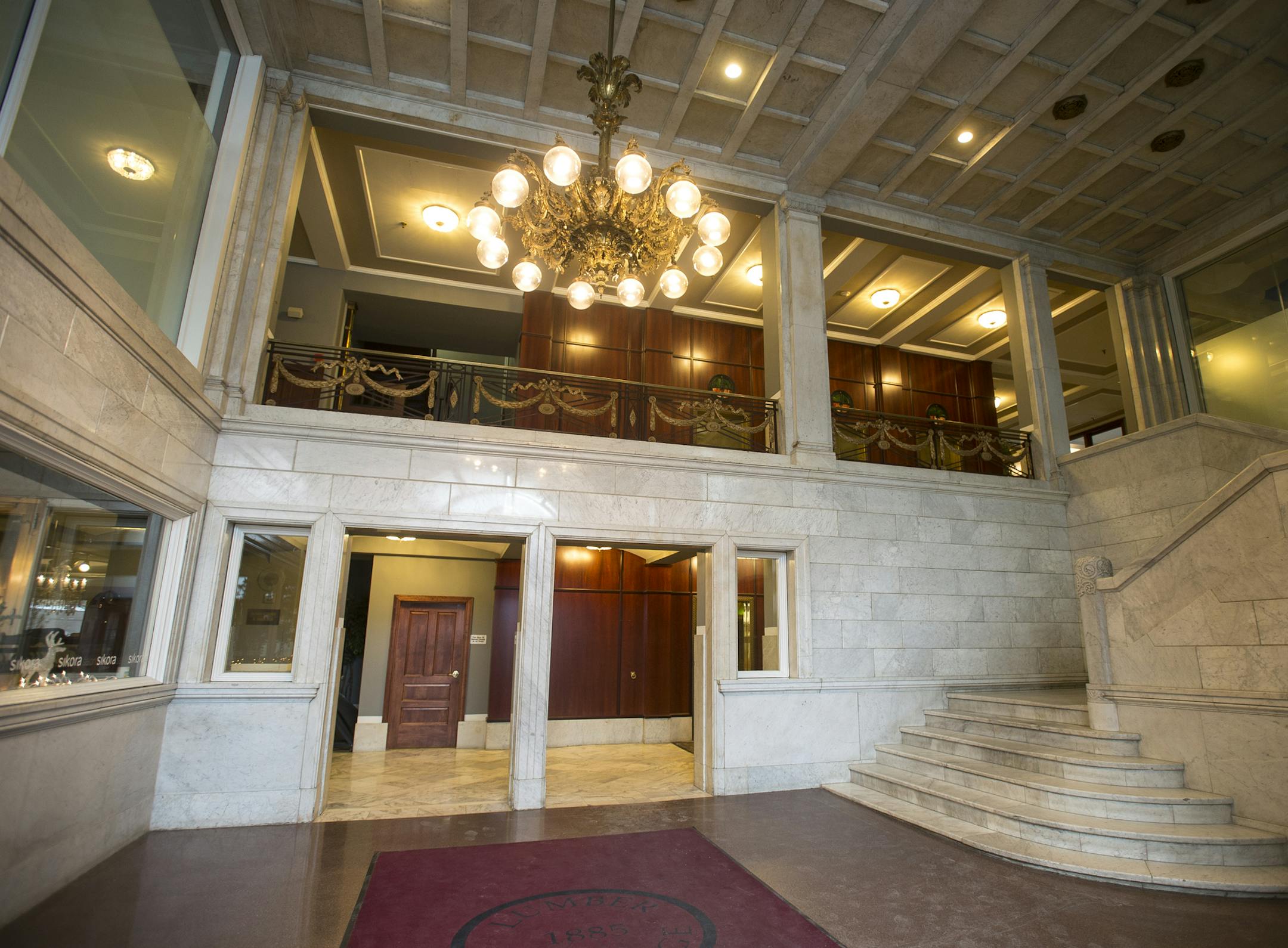White marble dominates the lobby of the historic Lumber Exchange.