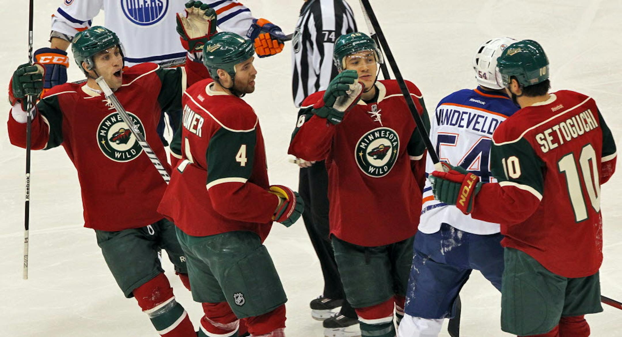 Wild players celebrated their first goal of the game -- a slapshot by Jared Spurgeon.