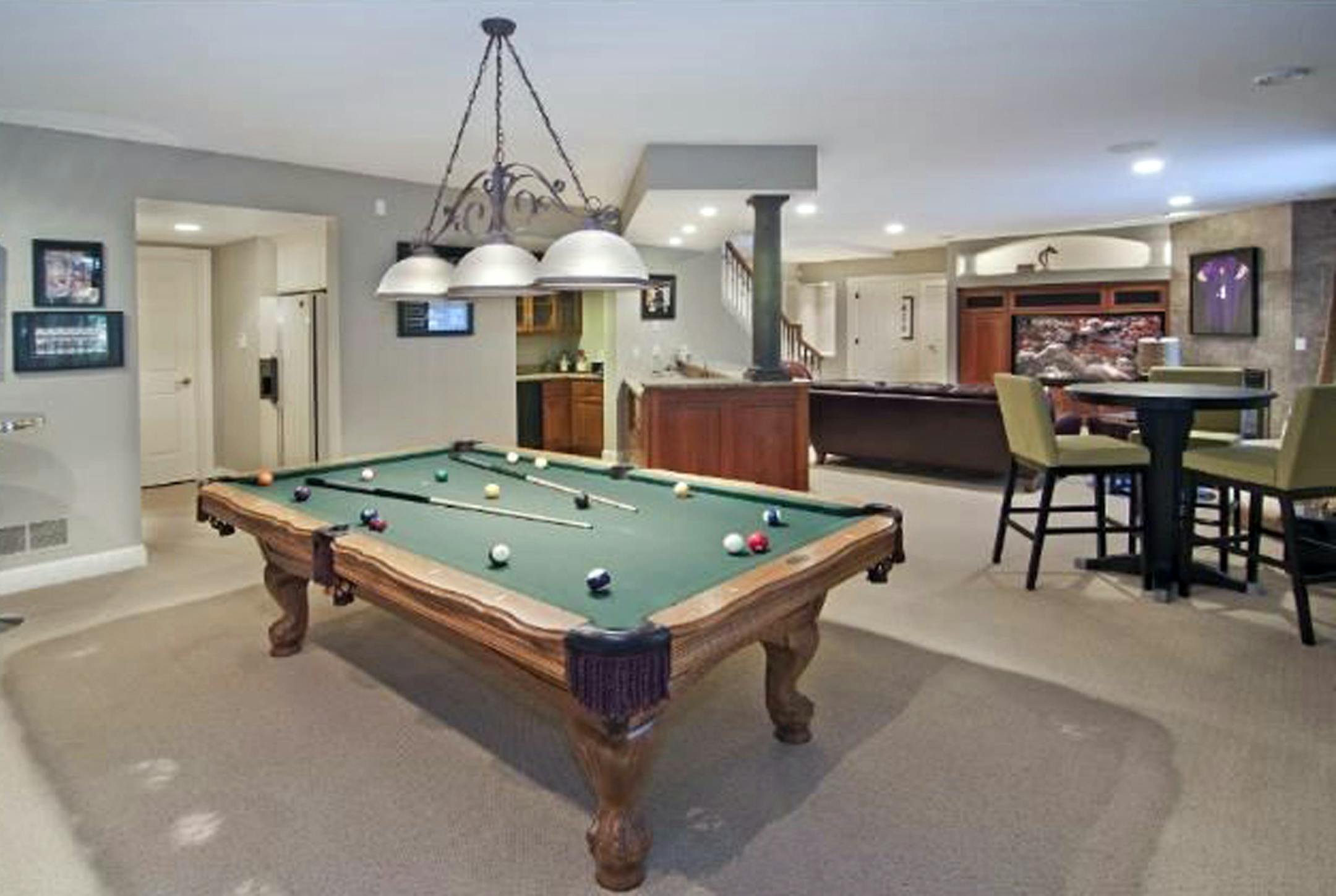 The 5,540-square foot home is in a gated neighborhood in the community of Tonka Bay.