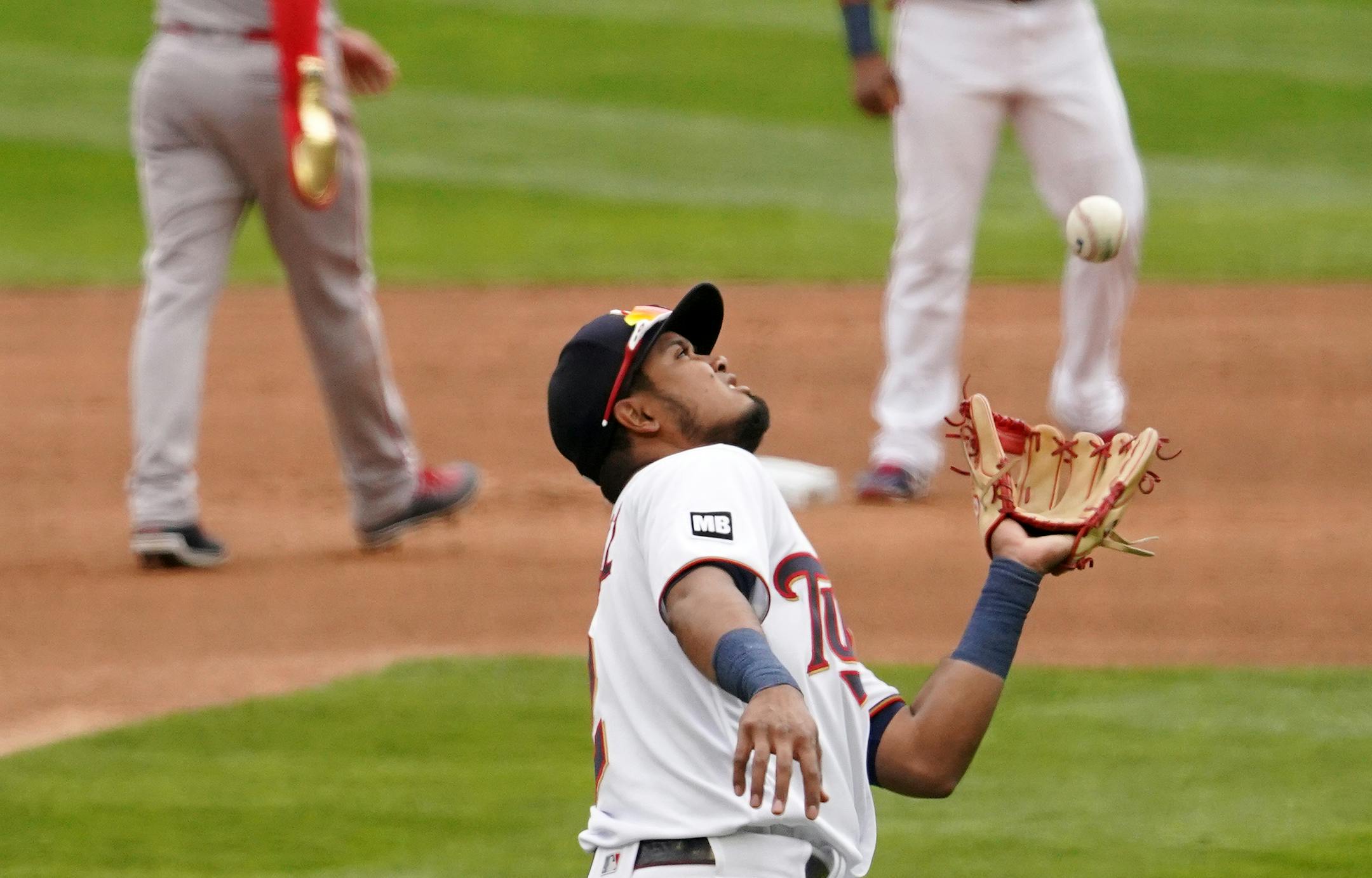 Minnesota Twins second baseman Luis Arraez (2) fielded a pop fly hit by Boston Red Sox shortstop Xander Bogaerts (2) in the first inning.