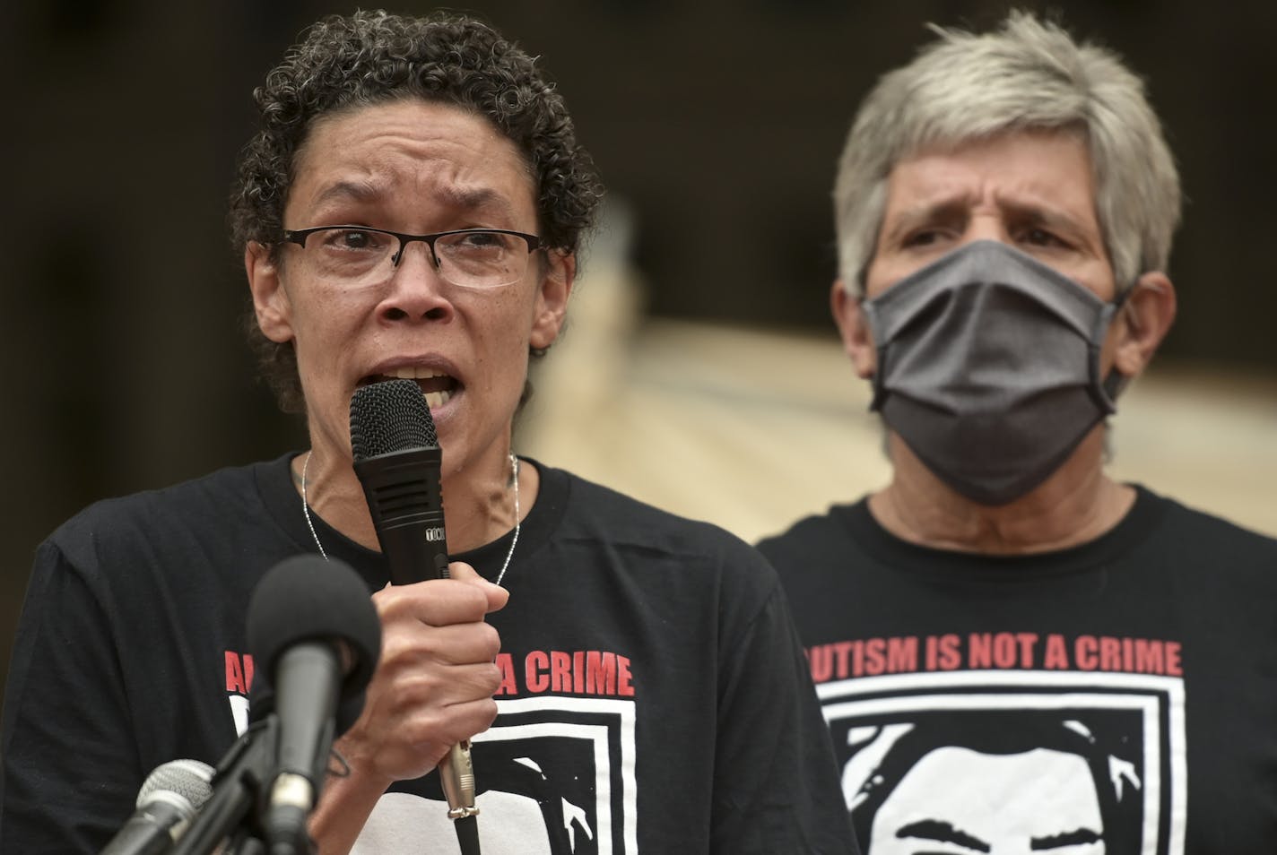 Amity Dimock, mother of 21-year old Kobe Heisler, shot and killed by Brooklyn Center Police last summer, was overcome with emotion at Wednesday's press conference in which family members and activists decried Hennepin County Attorney Mike Freeman's decision not to press charges against the officers involved in the shooting. Kobe's stepfather, John Garcia, stood beside Dimock. ] aaron.lavinsky@startribune.com A press conference was held to decry the decision by Hennepin County Attorney Mike Freem