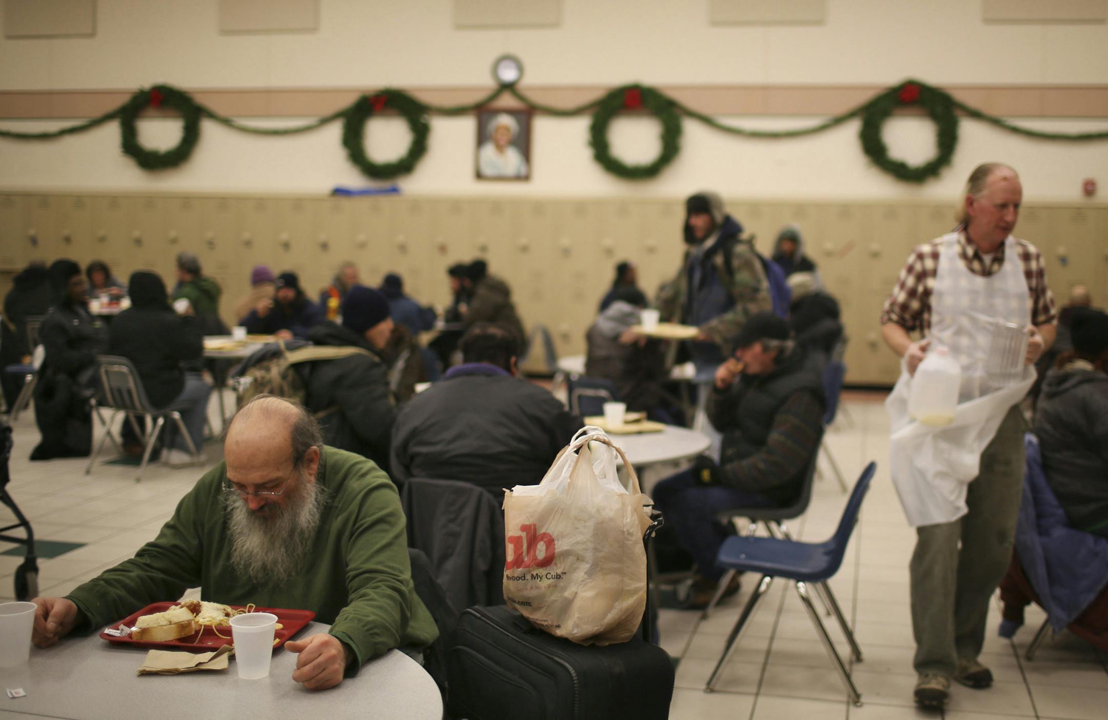A task force to rethink the Dorothy Day Center in downtown St. Paul is recommending a $64 million project that would locate a shelter and opportunity center in the northeast corner of downtown and build permanent housing on the current site near the Xcel Energy Center. The Dorothy Day Center in downtown St. Paul Thursday night, December 19, 2013 during the evening meal when more than 200 people were served. ] JEFF WHEELER ‚Äö√Ñ¬¢ jeff.wheeler@startribune.co