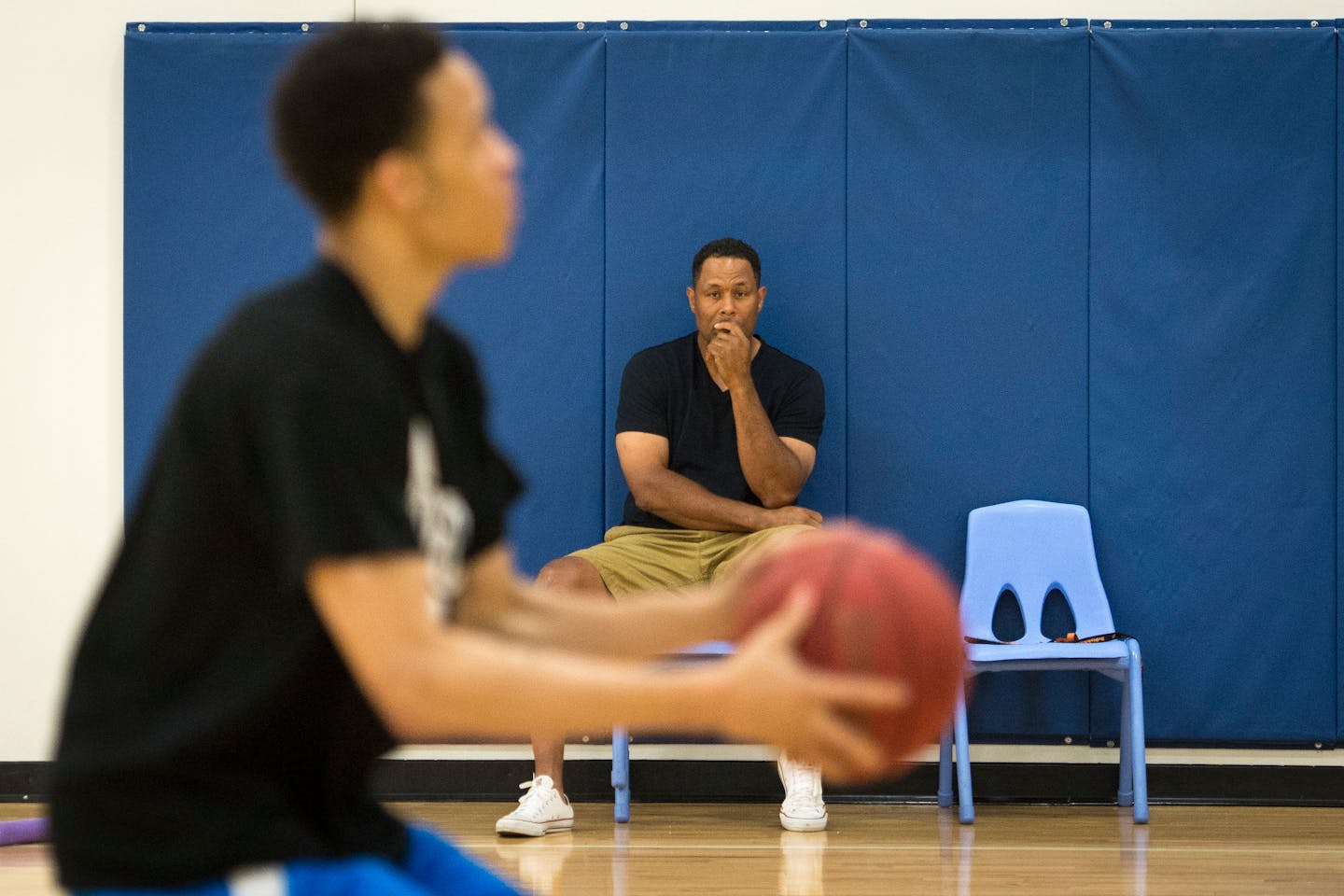 Richard Coffey watched as his son Amir worked out last summer.