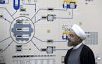 FILE - In this Jan. 13, 2015, file photo released by the Iranian President's Office, President Hassan Rouhani visits the Bushehr nuclear power plant j