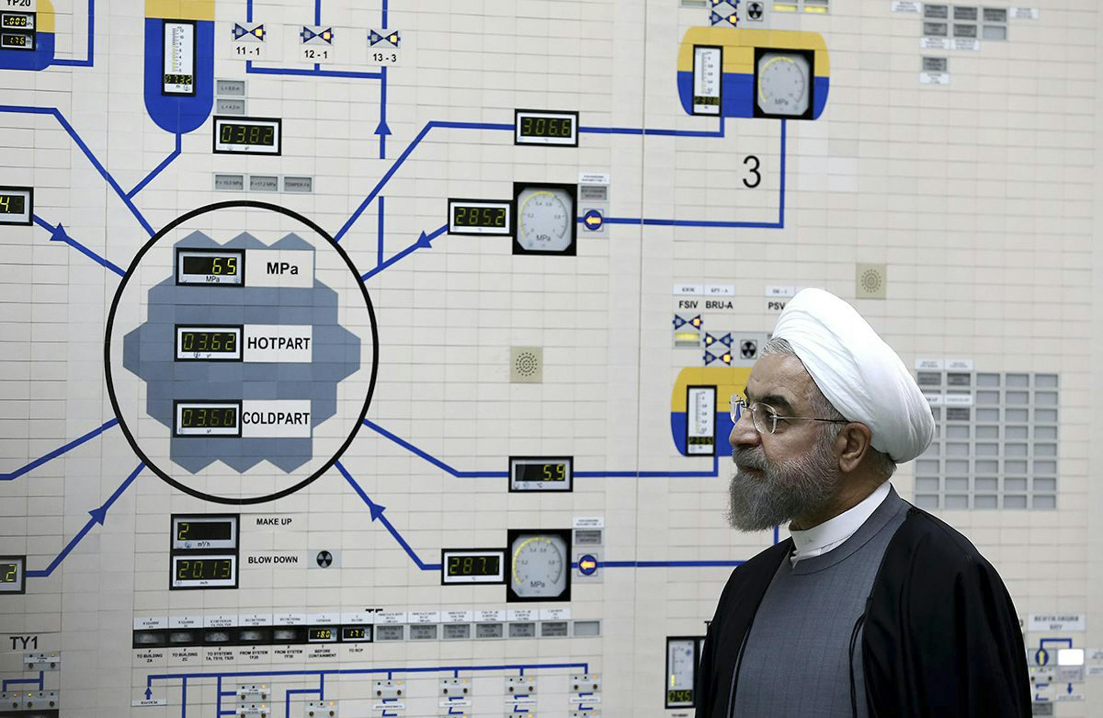 FILE - In this Jan. 13, 2015, file photo released by the Iranian President's Office, President Hassan Rouhani visits the Bushehr nuclear power plant just outside of Bushehr, Iran.