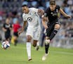 Mason Toye (23) of Minnesota United, who scored the winning goal against Houston on Tuesday, fought for the ball with Graham Smith of Sporting Kansas 