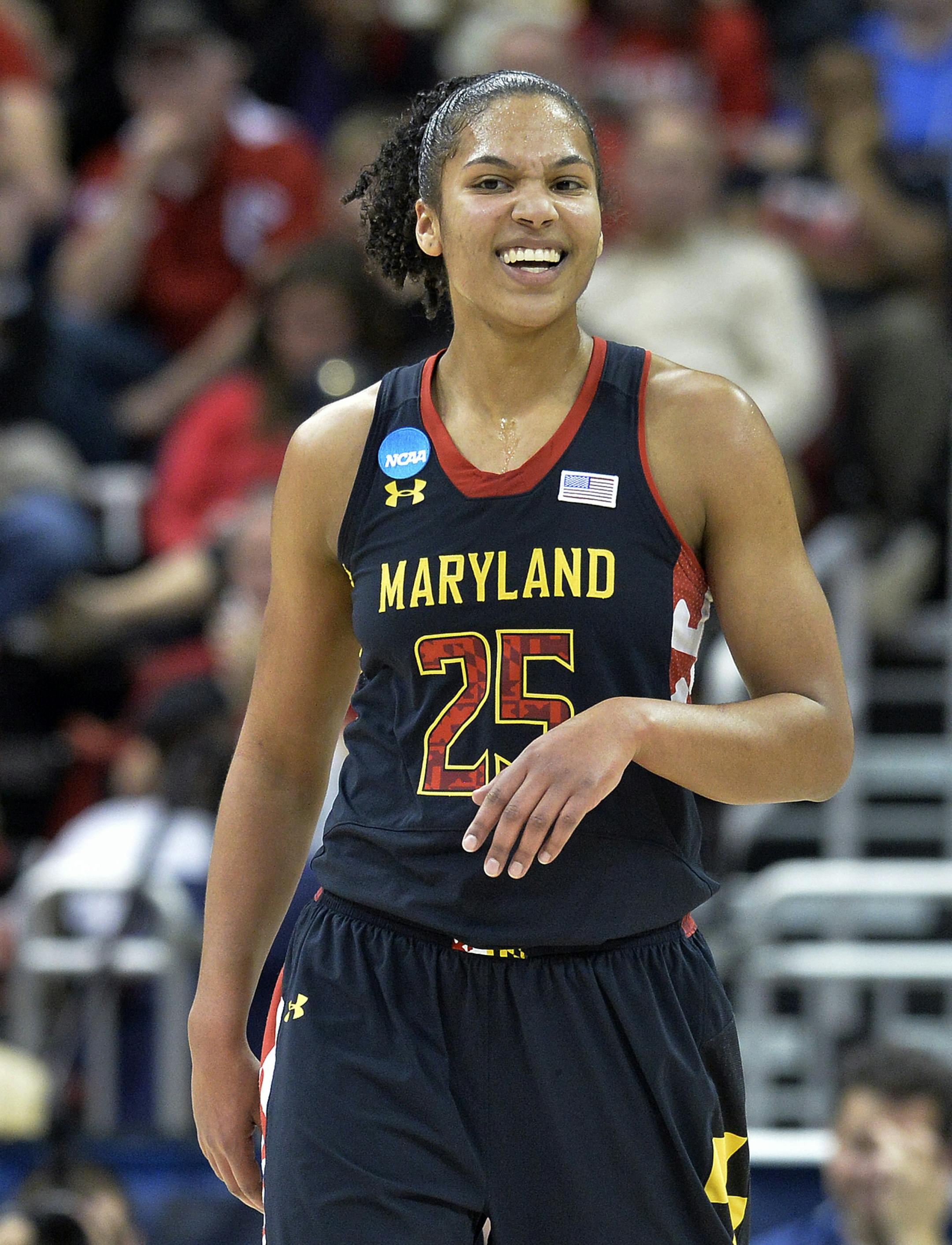 Maryland's Alyssa Thomas smiles following a play during the second half against Louisville in the regional final of the NCAA women's college basketball tournament, Tuesday, April 1, 2014, in Louisville, Ky. Maryland defeated Louisville 76-73. (AP Photo/Timothy D. Easley)