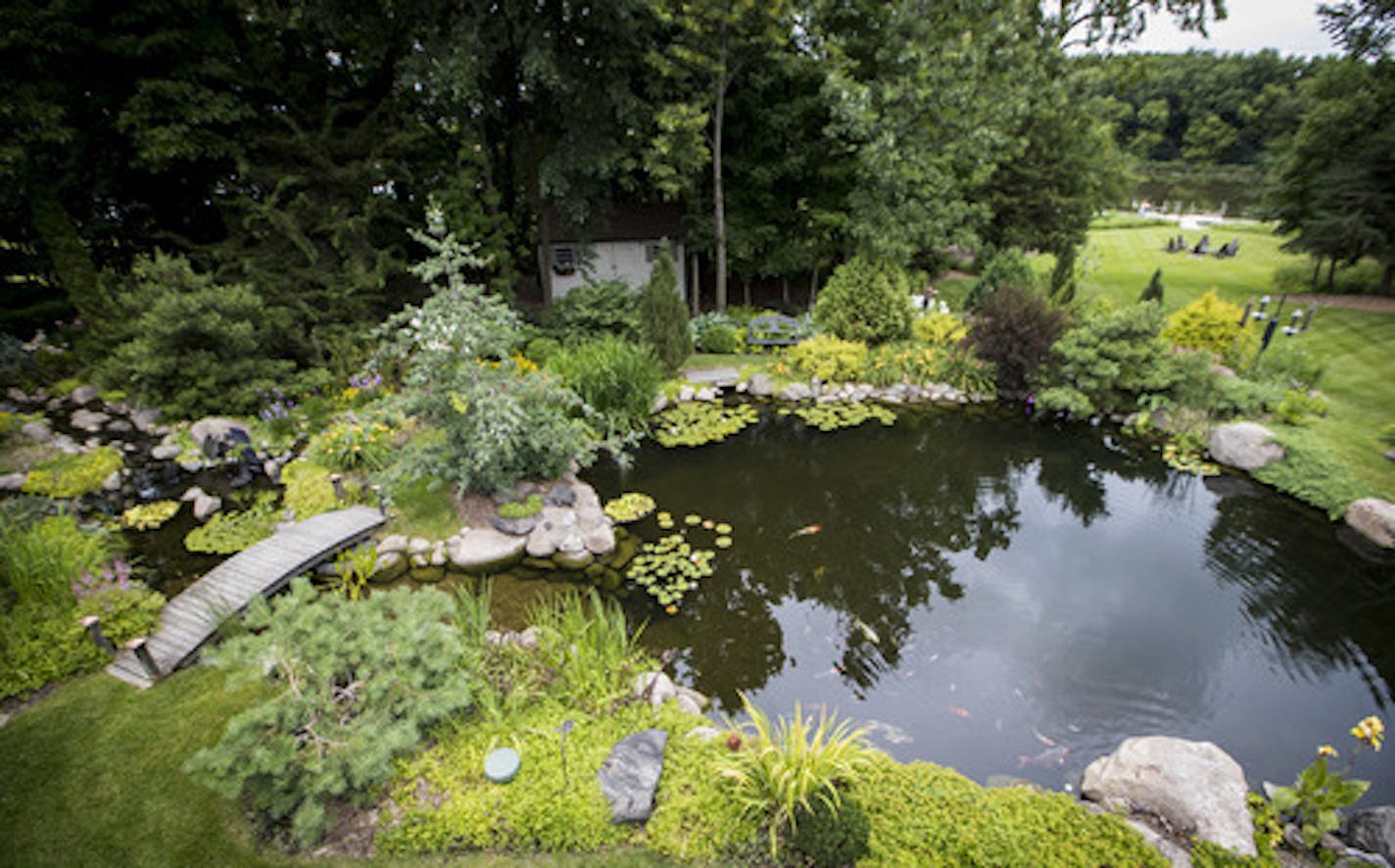 The koi pond in Karen and Emery Koenig garden in their home in Waconia, Minn., on July 14, 2017. ] RENEE JONES SCHNEIDER &#xa5; renee.jones@startribune.com