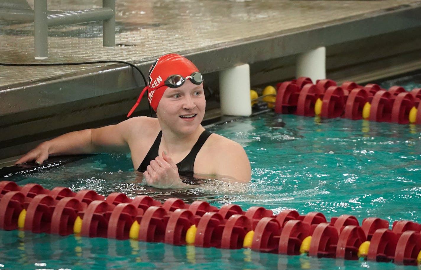 Eden Prairie's Caroline Larsen looks back at the scoreboard after finishing the 50M free at the Class 2A girls' swimming state meet at the Jean K. Freeman Aquatic Center on the University of Minnesota campus in Minneapolis, Minn., on Saturday, Nov. 20, 2021. ] SHARI L. GROSS • shari.gross@startribune.com