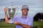 Robert Streb held the trophy after winning the RSM Classic on Sunday, his first PGA Tour victory since his initial Tour win six years ago.