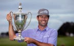 Robert Streb held the trophy after winning the RSM Classic on Sunday, his first PGA Tour victory since his initial Tour win six years ago.