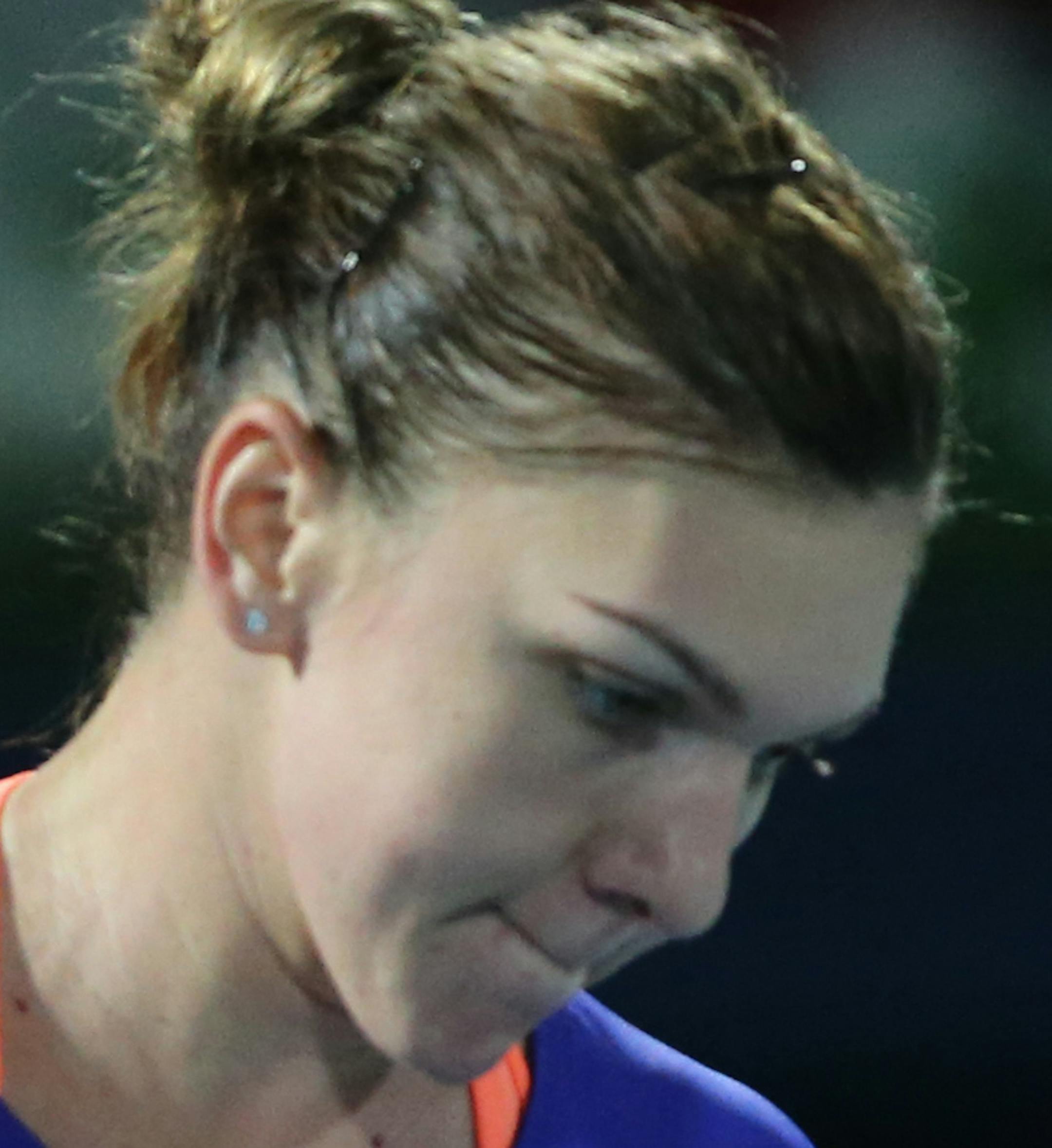 Simona Halep of Romania reacts against Karolina Pliskova of the Czech Republic during the final match of the Dubai Duty Free Tennis Championships in Dubai, United Arab Emirates, Saturday, Feb. 21, 2015. (AP Photo/Kamran Jebreili)
