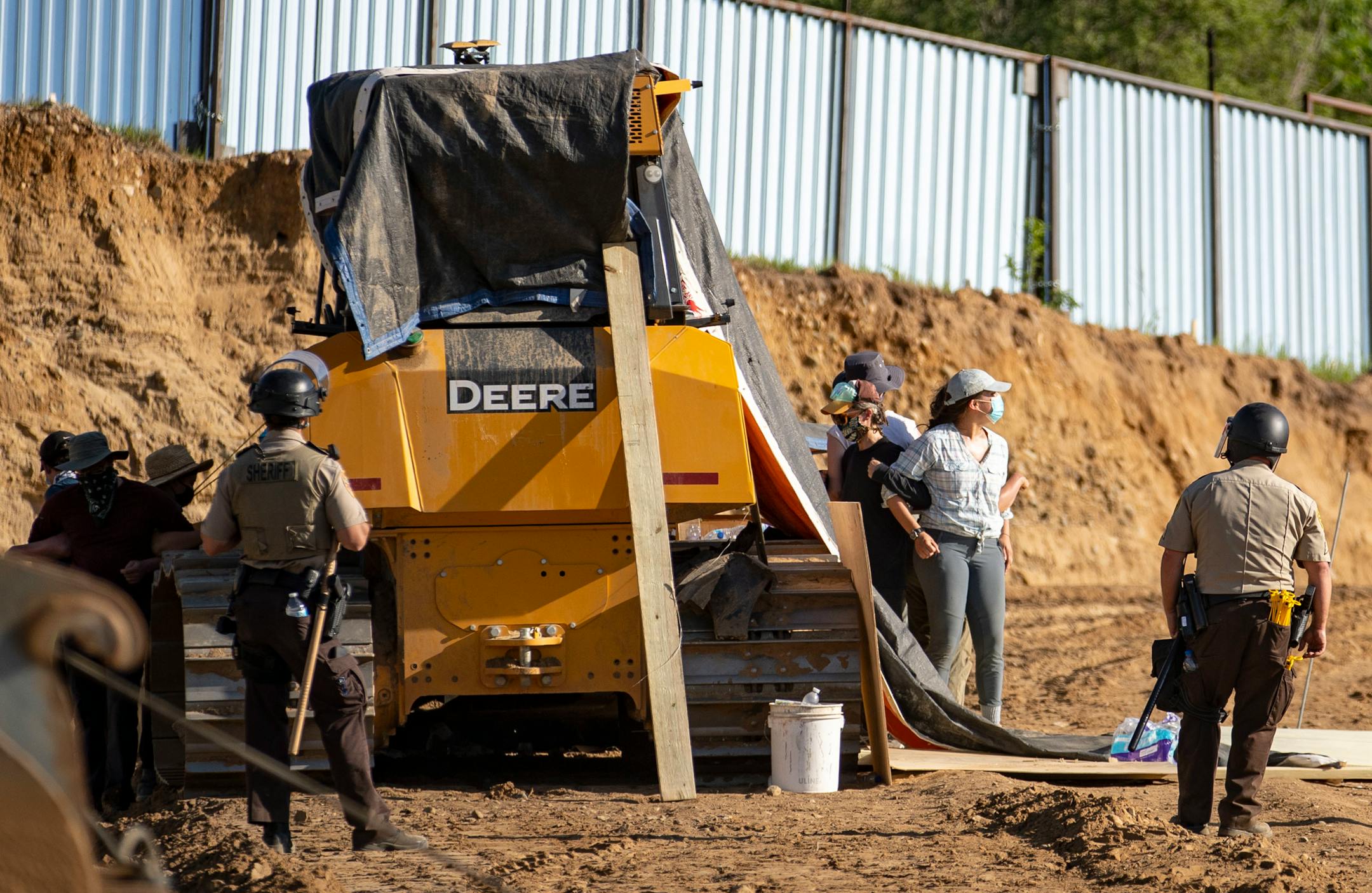 Indigenous protestors and their allies occupied an active Enbridge pump station, some physically chaining themselves to equipment, on Monday, forcing over forty workers to leave.