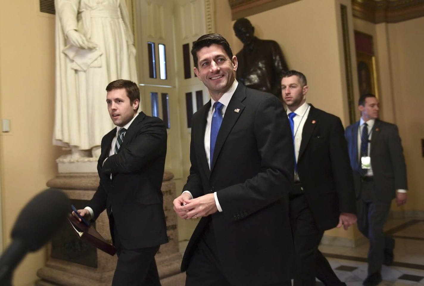 House Speaker Paul Ryan of Wis., walks to the House floor on Capitol Hill in Washington, Tuesday, Dec. 19, 2017. Republicans are ready to ram a $1.5 trillion tax package through Congress, giving President Donald Trump the legislative win he desperately wants.