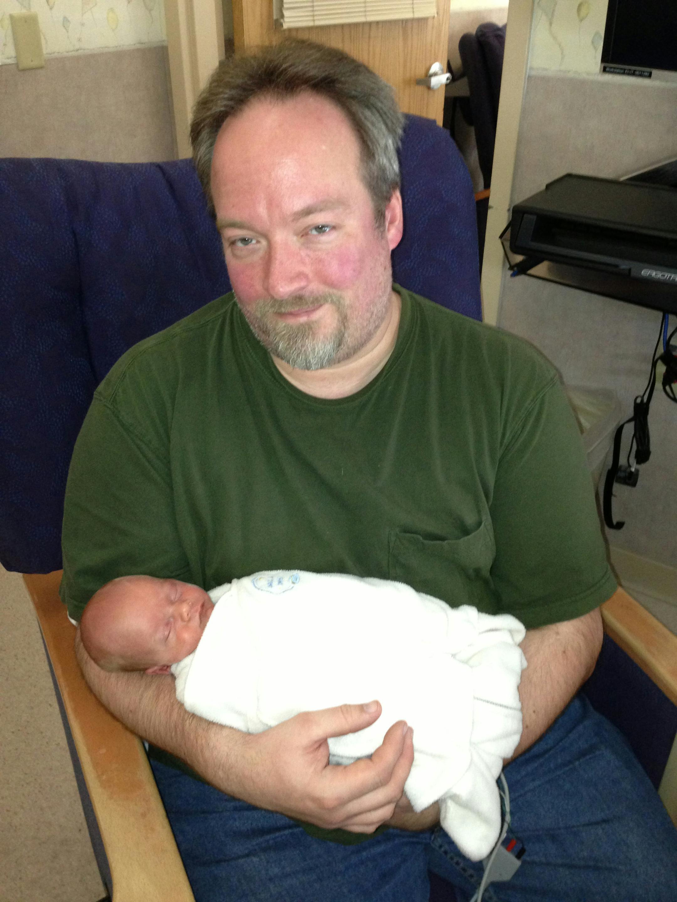 Mike Schellman with baby Wolfie