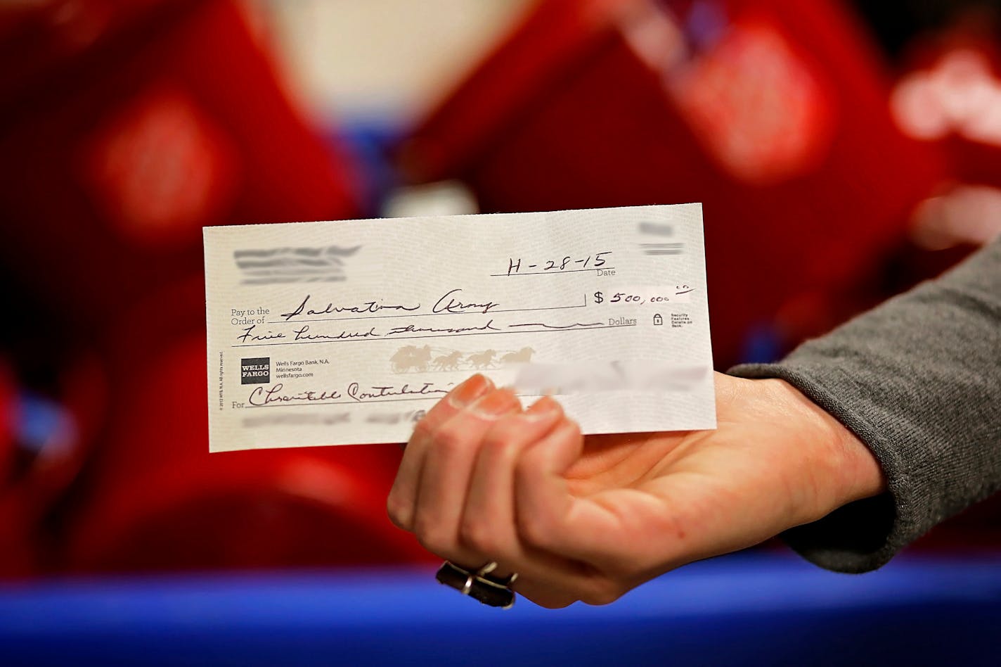 The check for $500,000 was deposited into a Rosemount Salvation Army kettle. The Salvation Army has obscured the donors' identities because they want to remain anonymous.