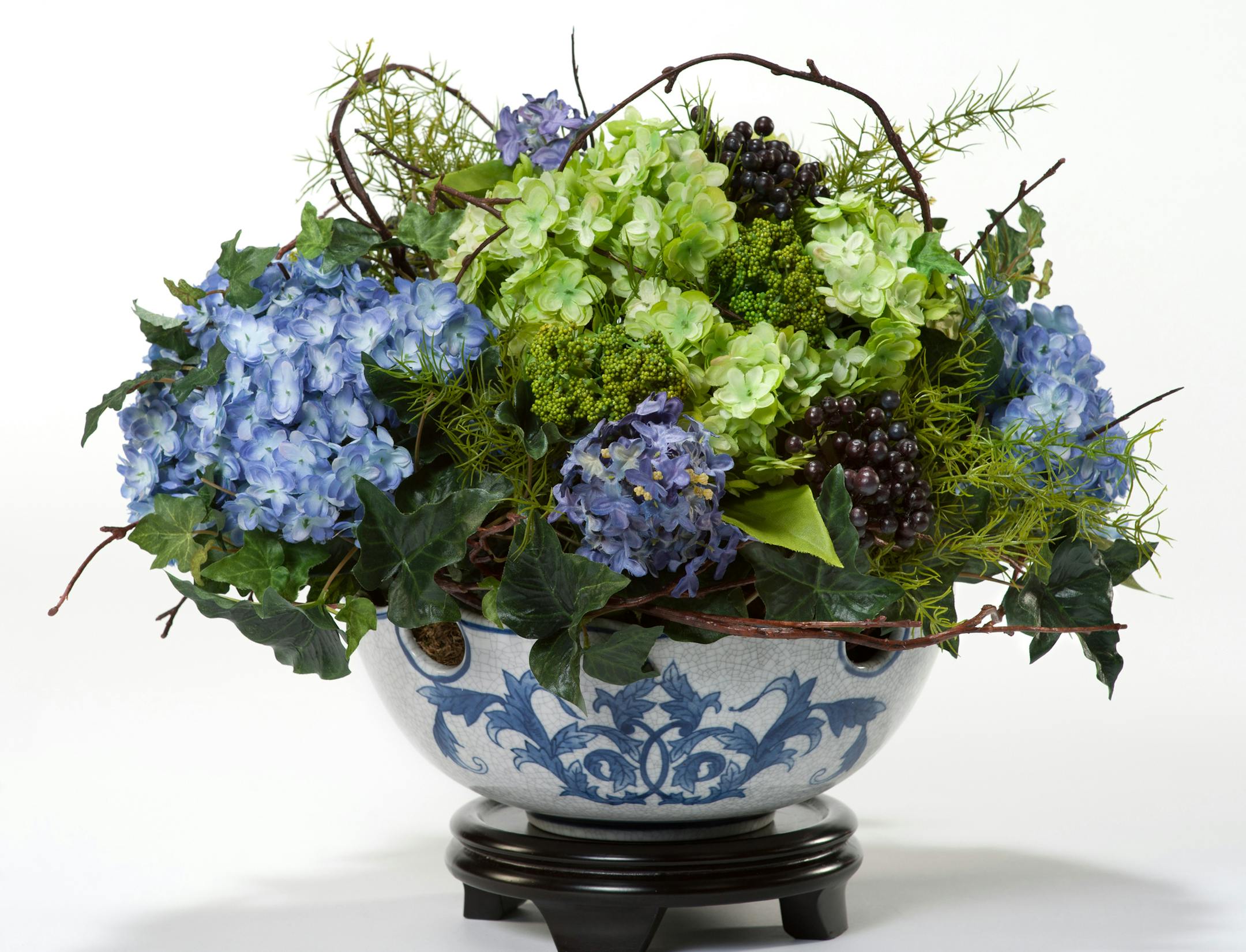 A hydrangea and berries arrangement from Petals.com
Provided by Petals.com
