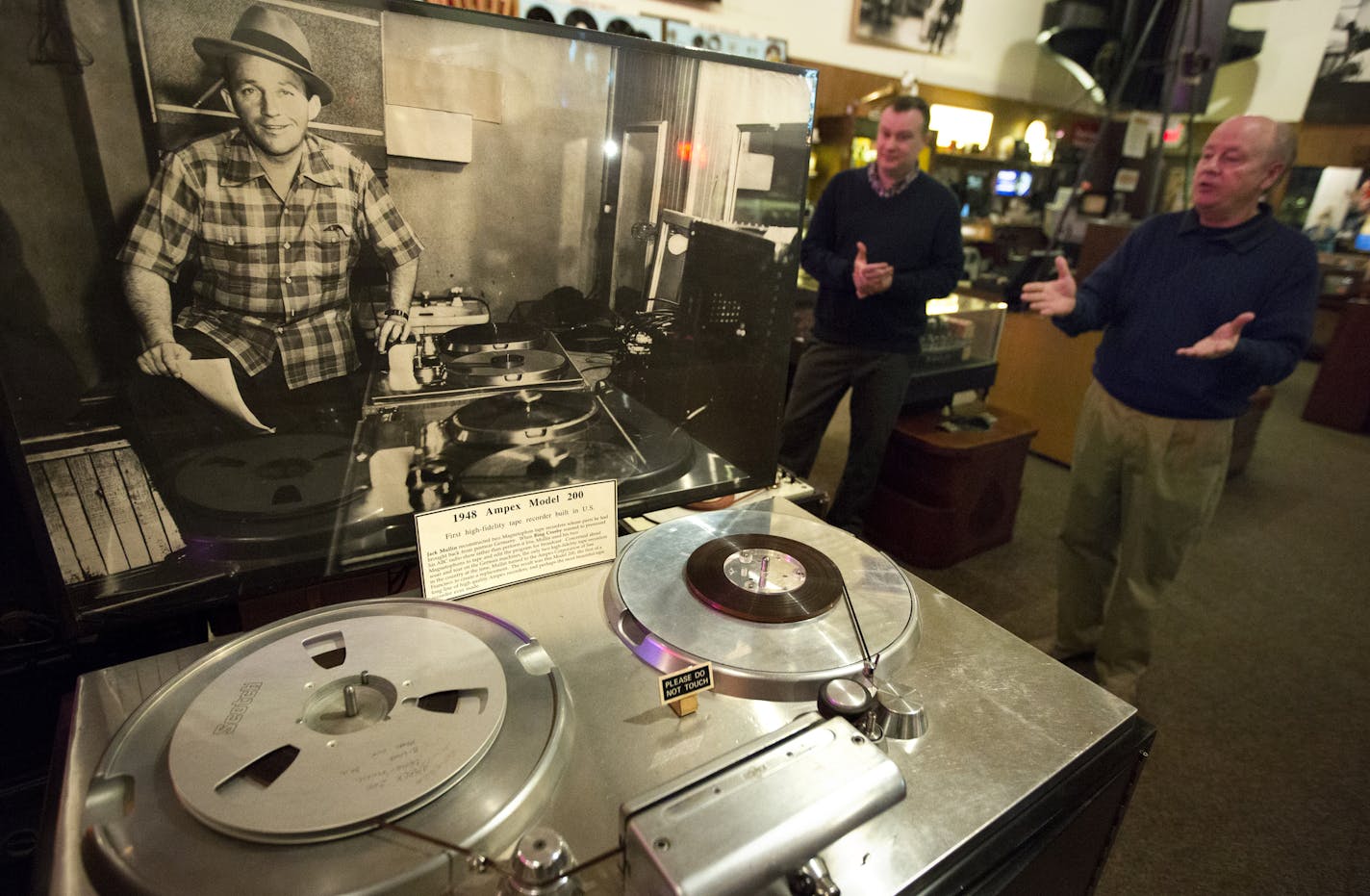 Steve Ramer (right) shows off a 1948 Ampex Model 200, the first high-fidelity tape recorder built in the U.S. The Pavek Museum of Broadcasting in St. Louis Park is selling a treasure trove of equipment and memorabilia from its bulging warehouse. The Ampex is not for sale. ] Brian.Peterson@startribune.com St. Louis Park, MN - 5/05/2015