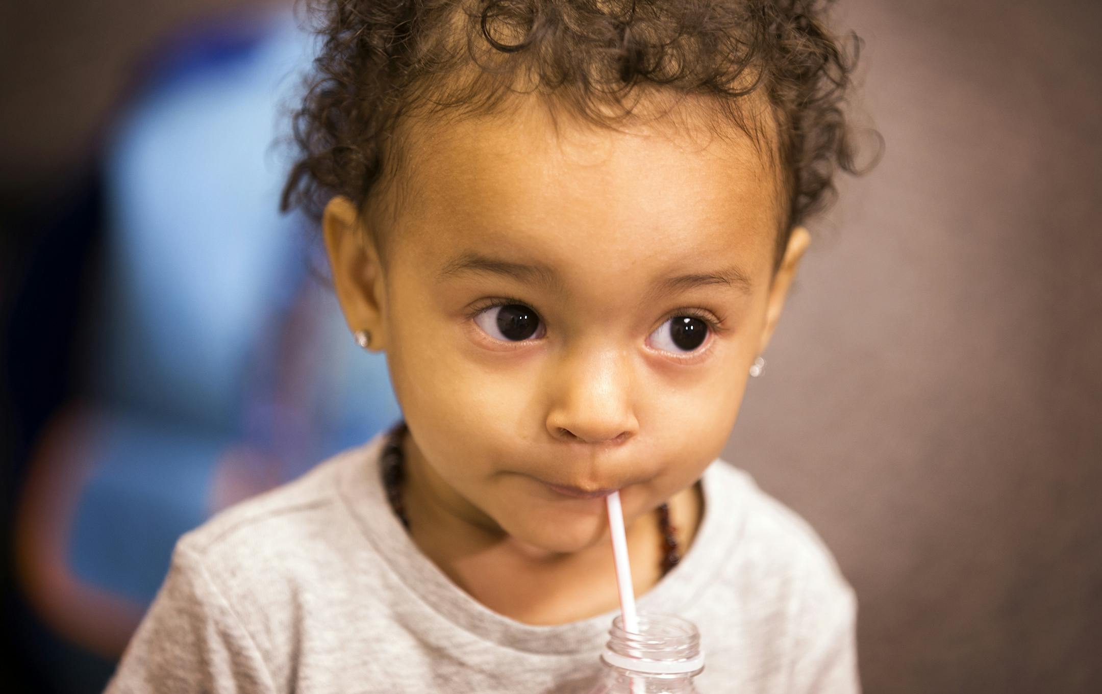 Eden Spielman, a 15-month old who was shot last week near Peavey Park in south Minneapolis, meets with the media with her family at the Minneapolis Police Department headquarters on Friday, June 26, 2015. ] LEILA NAVIDI leila.navidi@startribune.com / BACKGROUND INFORMATION: Shandrea Spielman and her 15-month-old daughter Eden were both injured after being shot near Peavey Park in south Minneapolis last week. Donate Denae Peterson of Minneapolis was charged with multiple counts of attempted secon