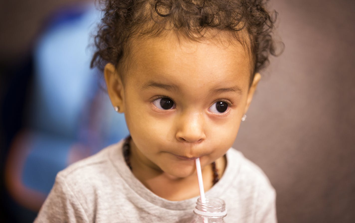Eden Spielman, a 15-month old who was shot last week near Peavey Park in south Minneapolis, meets with the media with her family at the Minneapolis Police Department headquarters on Friday, June 26, 2015. ] LEILA NAVIDI leila.navidi@startribune.com / BACKGROUND INFORMATION: Shandrea Spielman and her 15-month-old daughter Eden were both injured after being shot near Peavey Park in south Minneapolis last week. Donate Denae Peterson of Minneapolis was charged with multiple counts of attempted secon