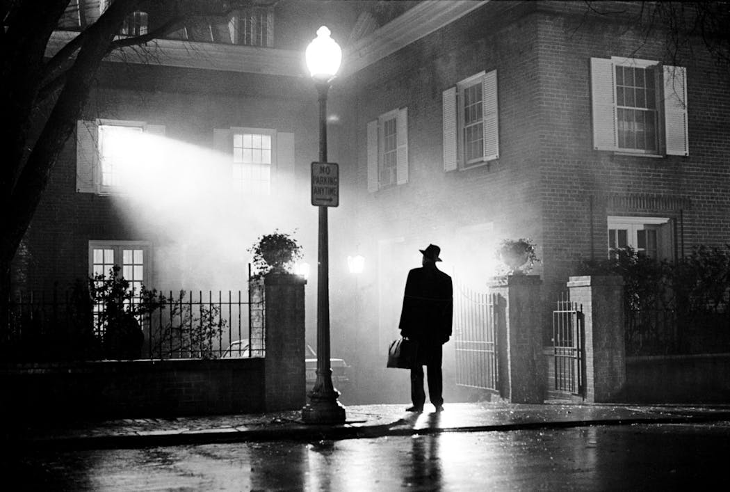 Warner Home Video Max Von Sydow as Father Merrin silhouetted in the light from the bedroom window and street lamp in “The Exorcist.”
