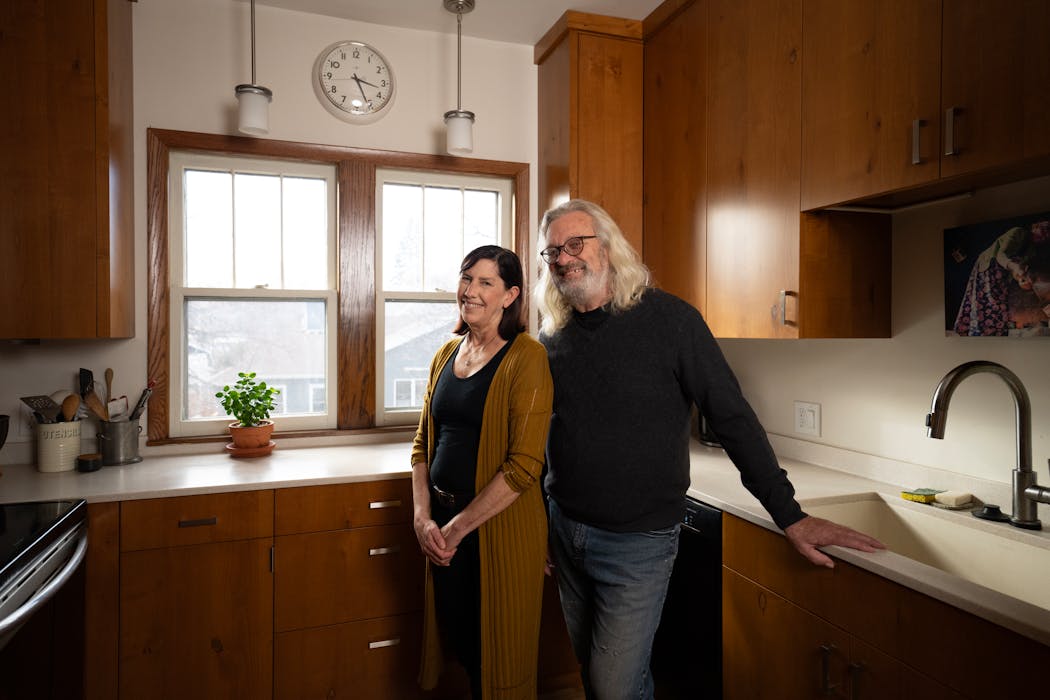 Suzy Ahrens and Steve Hine updated their kitchen and added a second bathroom when the family downsized two years ago and moved into a duplex they owned in St. Paul.