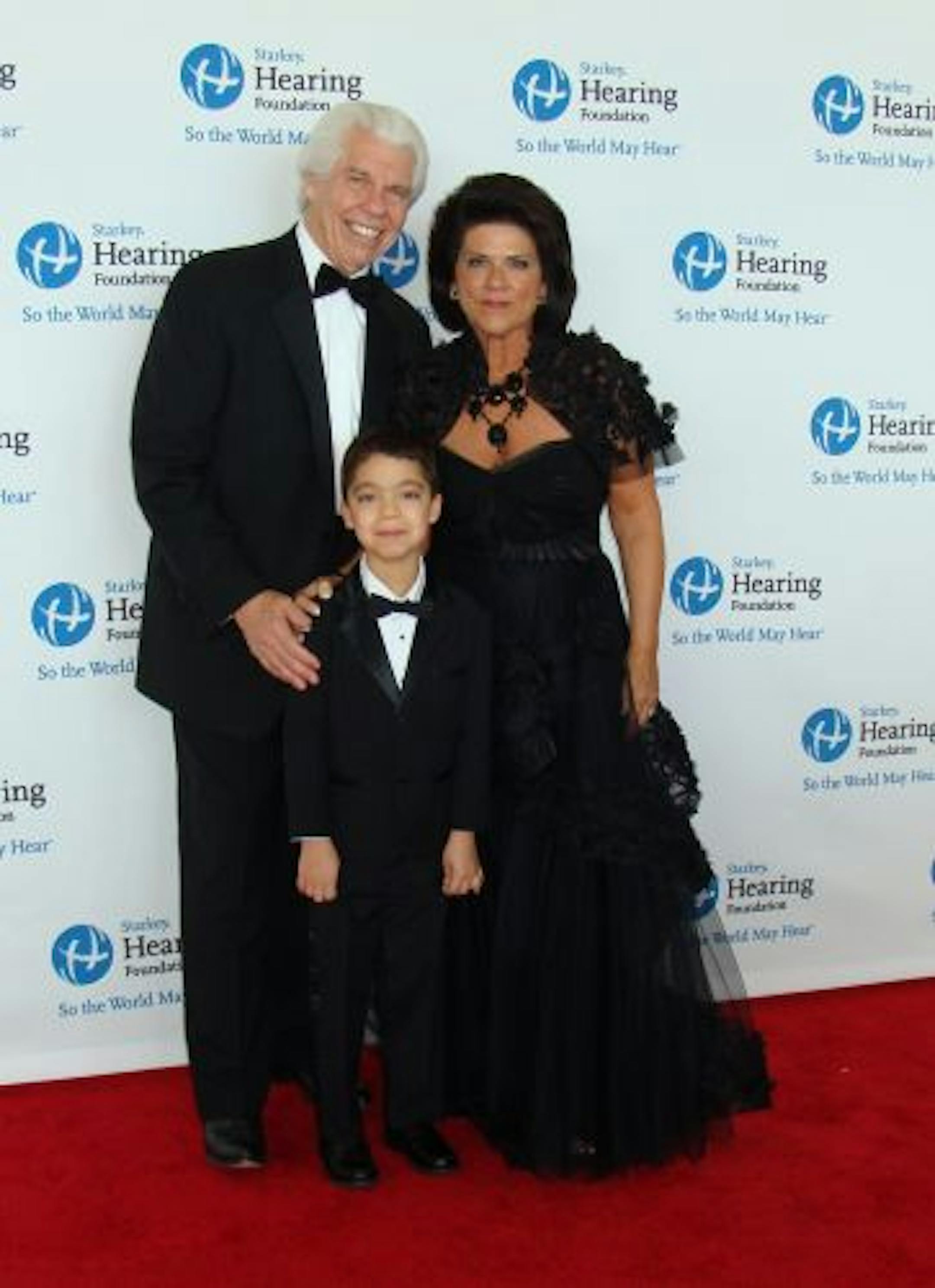 Hosts Bill and Tani Austin with piano prodigy Ethan Bortnick, who performed a song he composed just for the event.