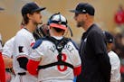 Twins starting pitcher Joe Ryan, left, listens to manager Rocco Baldelli, right, before being pulled from his start against the Yankees earlier this m