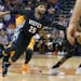 Minnesota Timberwolves' Mo Williams (25) loses the ball during the first half of an NBA basketball game against the Phoenix Suns, Friday, Jan. 16, 201