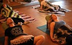 The art of deep relaxation is growing, popping up in yoga studios and some hospitals. At left, Matt and Paige Wildenauer at Healing Elements in St. Pa