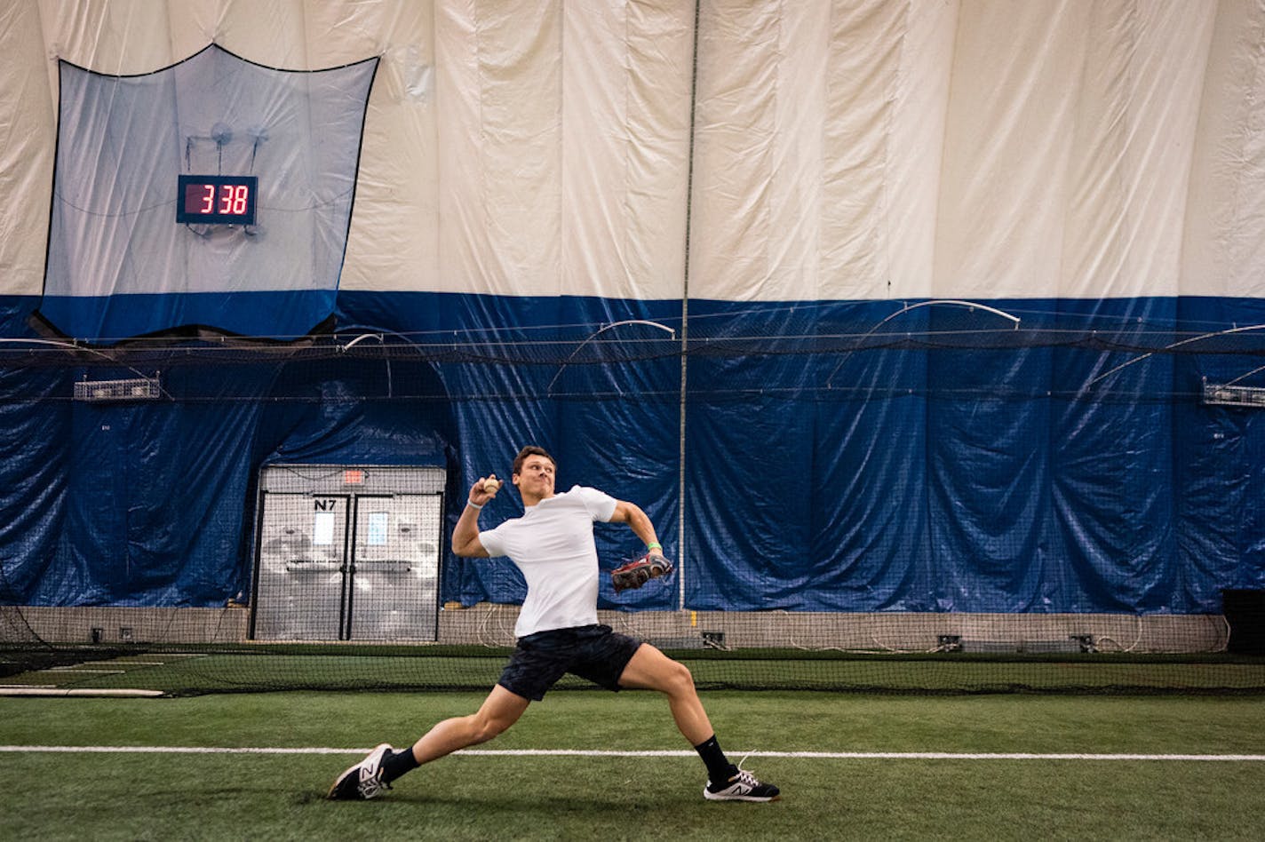 Ben Taxdahl, 17, of Savage, practiced his pitching during Savage Sports Center's open play time.