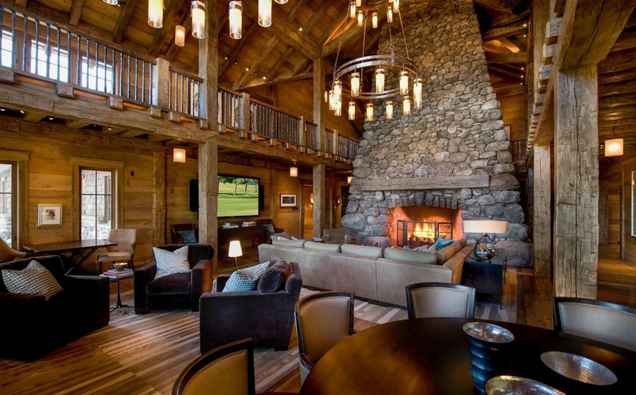 The great room features a 30-foot stone fireplace.