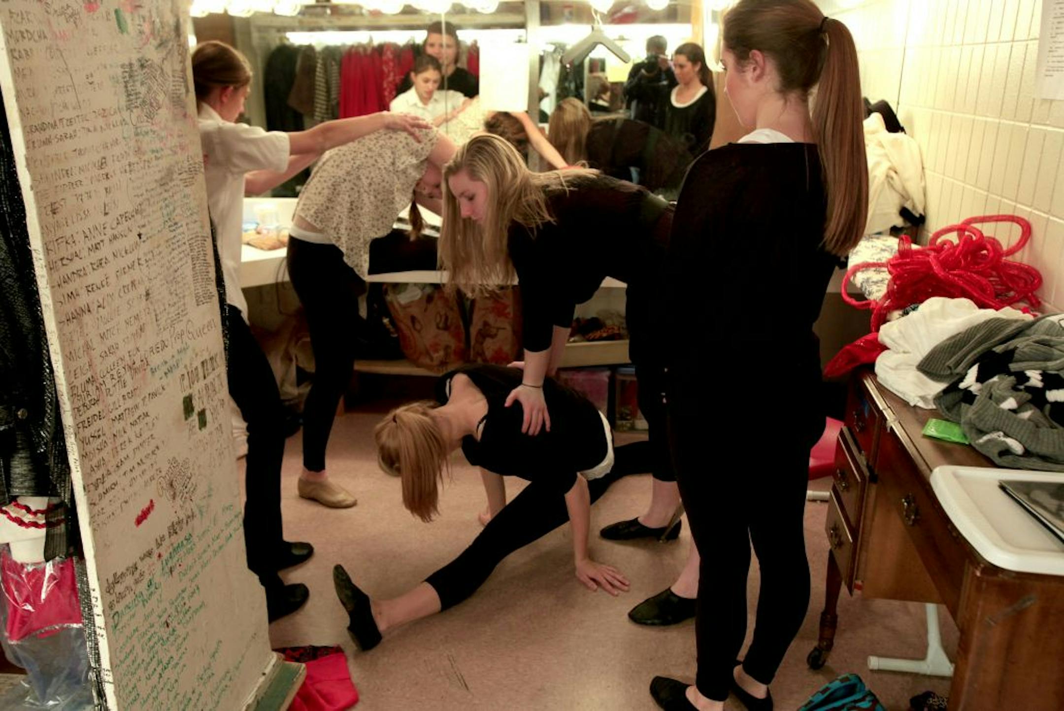 Actors get dressed for their rehersal at Visitation High School who are putting on a play at school in conjunction with Interact Center for the Arts, a theater company that helps disabled people perform. Mendota Heights, MN on January 30, 2013.