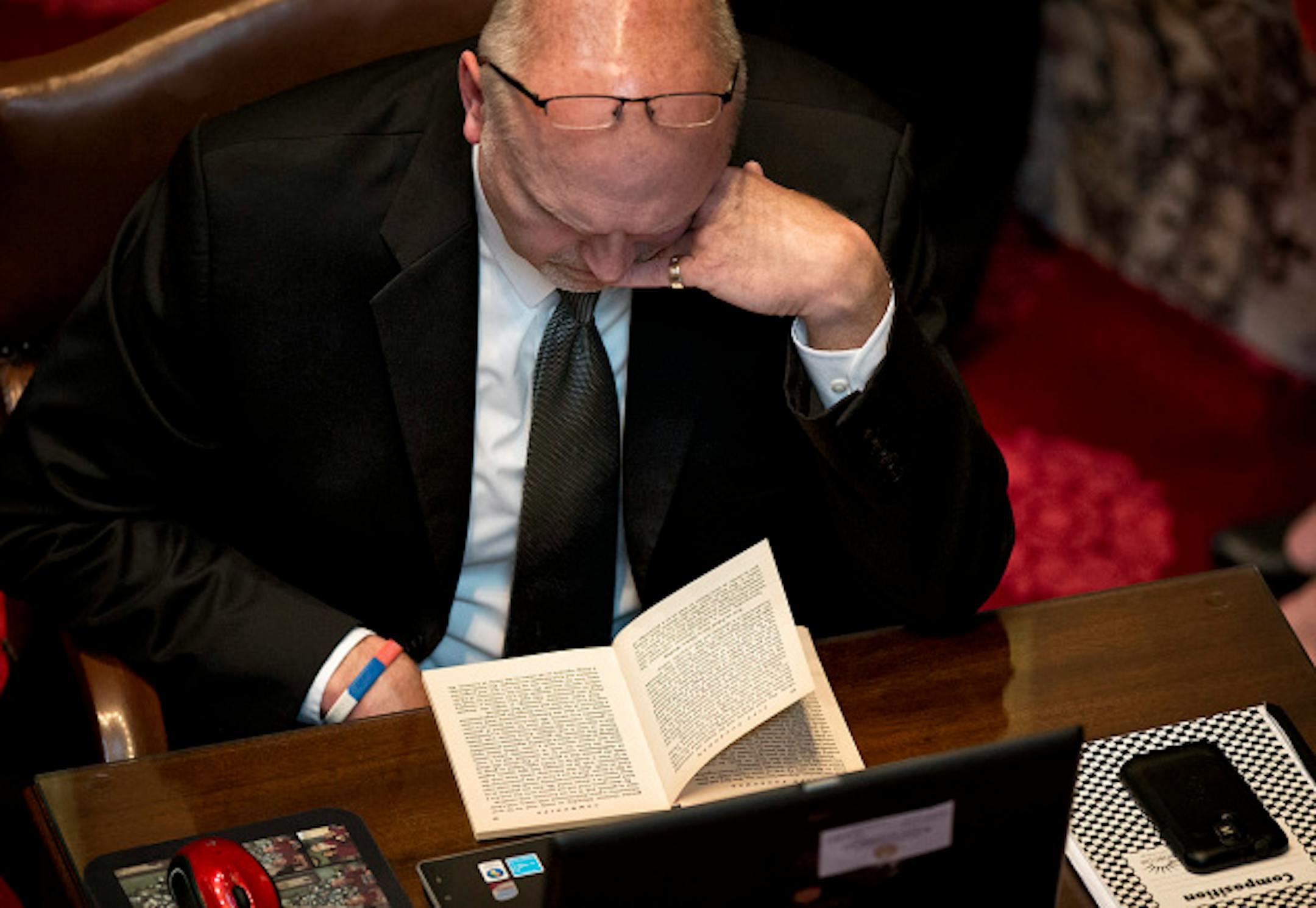 GOP Senator Roger Chamberlain read the book Life Together, Classic Explorqtion of Faith, during much of the floor debate.   Monday, May 13, 2013    ]   GLEN STUBBE * gstubbe@startribune.com