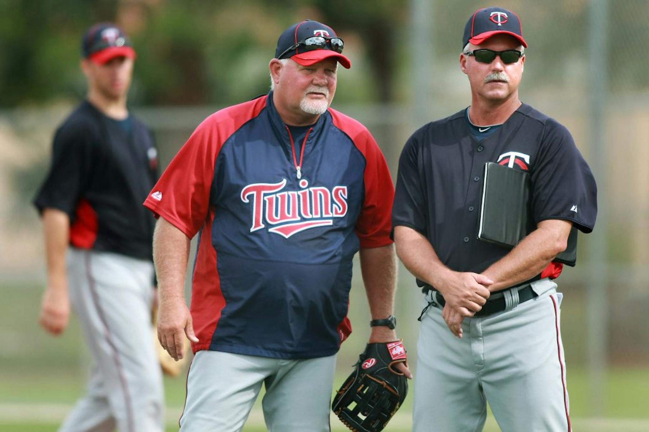 Ron Gardenhire, left, and former Twins pitching coach Rick Anderson watched some of the pitchers during infield drills during spring training in 2012.