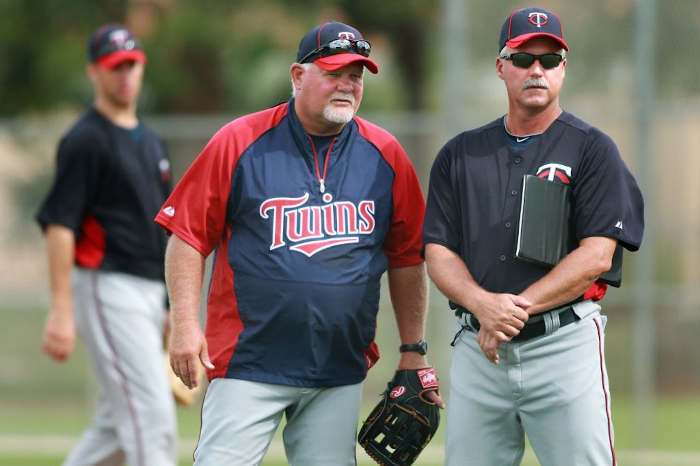 Ron Gardenhire, left, and former Twins pitching coach Rick Anderson watched some of the pitchers during infield drills during spring training in 2012.