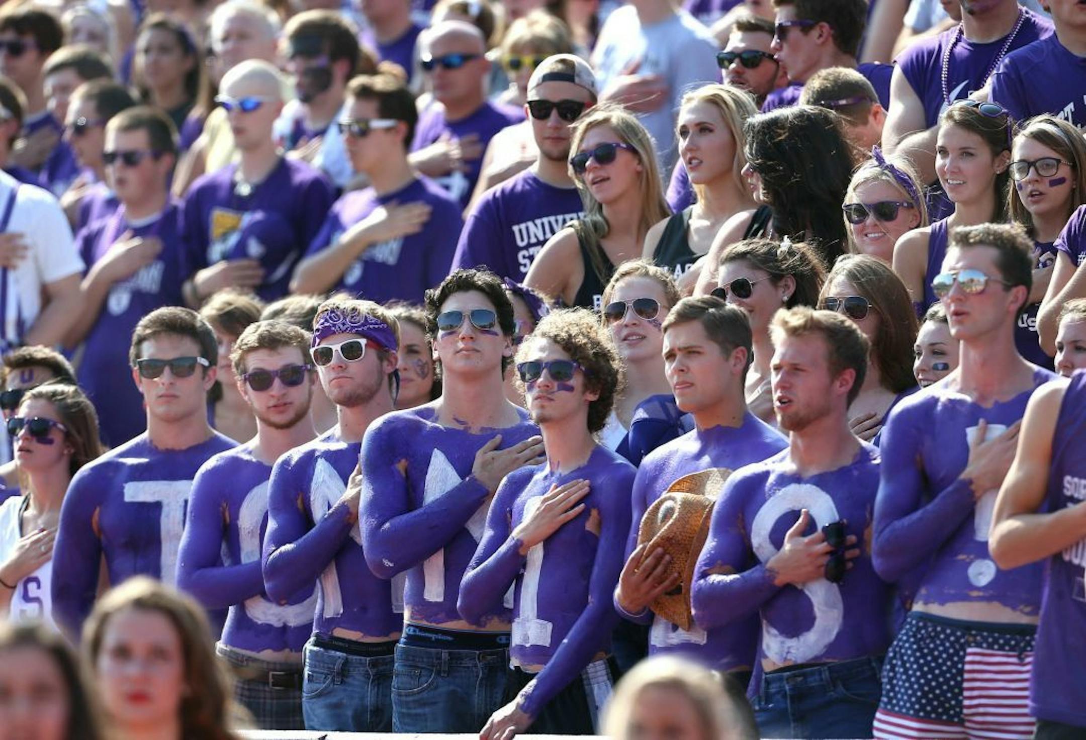 St. Thomas fans stood at attention as the national anthem was played before the start of the game against St. John's last season.