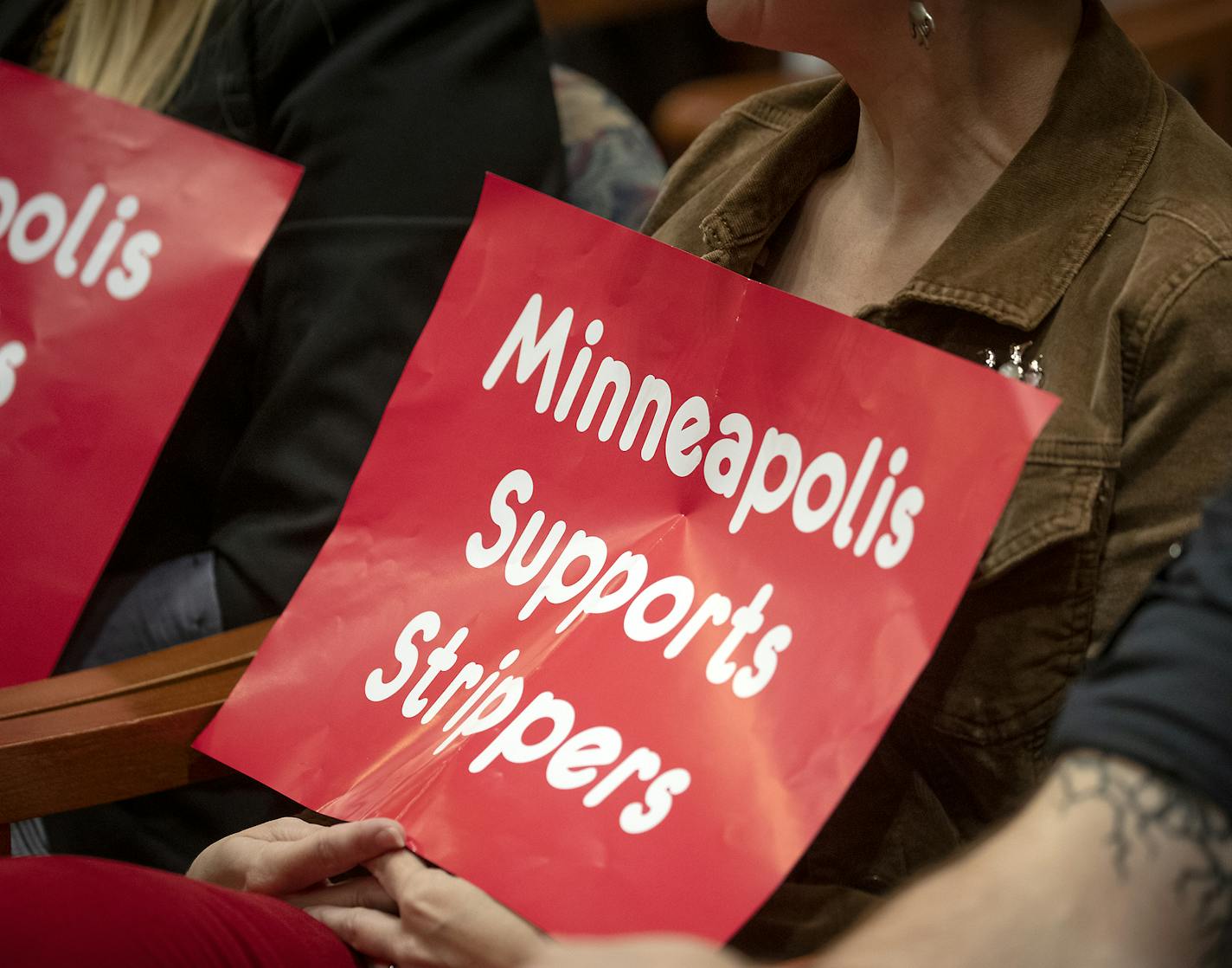 Activists with the Sex Workers Outreach Project showed their support for the city's new rules to protect adult entertainment workers on Friday, Aug. 23, at Minneapolis City Hall.