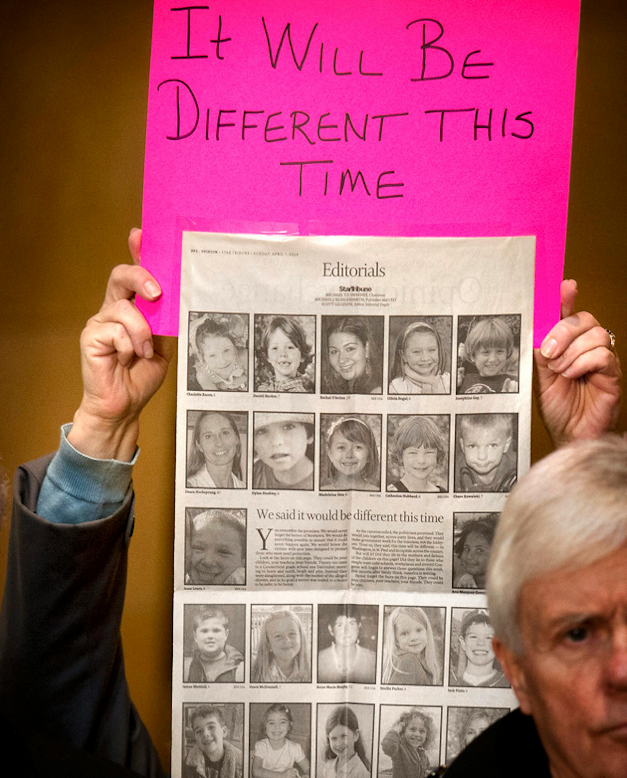 Someone held a newspaper page with the faces of Newtown school shooting victims.    The Minnesota Gun Violence Prevention Coalition, a group of faith, political, and community organizations held a news conference at the State Capitol outside of the House chambers asking the Minnesota House to act on background check legislation for gun sales. House Speaker Paul Thissen previously announced that a deal wasn't possible this year. Friday, May 3, 2013    ]   GLEN STUBBE * gstubbe@startribune.com
