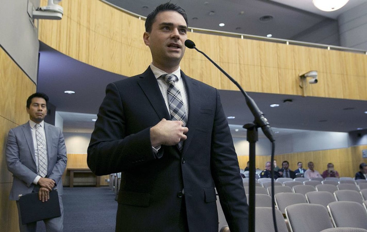 FILE - In this Oct. 3, 2017 photo, conservative writer Ben Shapiro speaks during the first of several legislative hearings planned to discuss balancing free speech and public safety in Sacramento, Calif. A University of Connecticut Republican student group has invited Shapiro to speak on Jan. 24, 2018, on campus in Storrs, Conn.