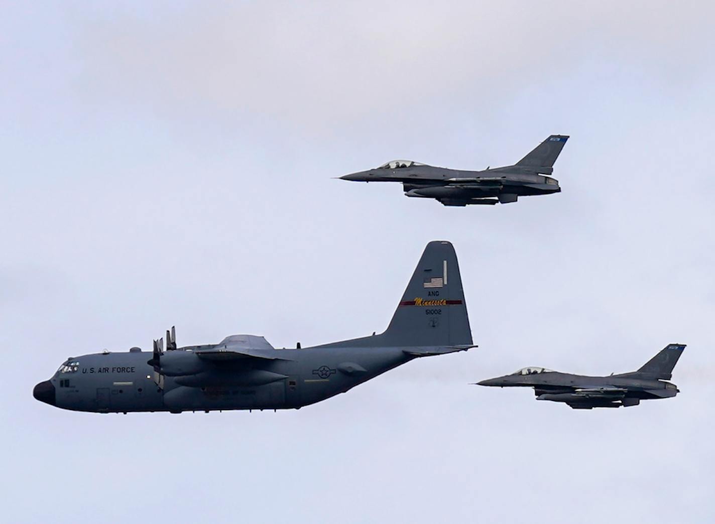 A pair of F-16 Fighting Falcon aircraft from the 148th Fighter Wing out of Duluth flanked a C-130 Hercules aircraft from the 133rd Air Wing out of Fort Snelling as it flew south from downtown Minneapolis, Wednesday, May 6, 2020, to honor frontline health care workers.