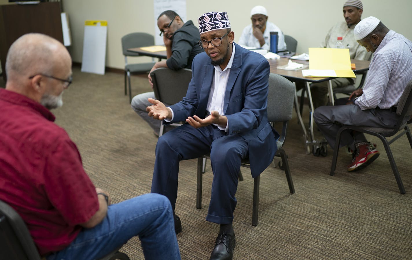 While demonstrating what counseling can look like during the training program Sunday, co-leader Sharif Mohamed, right, took the part of a hospital chaplain while in a role playing exercise with Kent Elliott Allen, who had the part of a patient. ] JEFF WHEELER &#x2022; jeff.wheeler@startribune.com Minnesota has launched one of the nation's first training programs to boost the ranks of Muslim hospital chaplains. Thirty Muslim leaders, including imams, are now attending classes to help prepare them