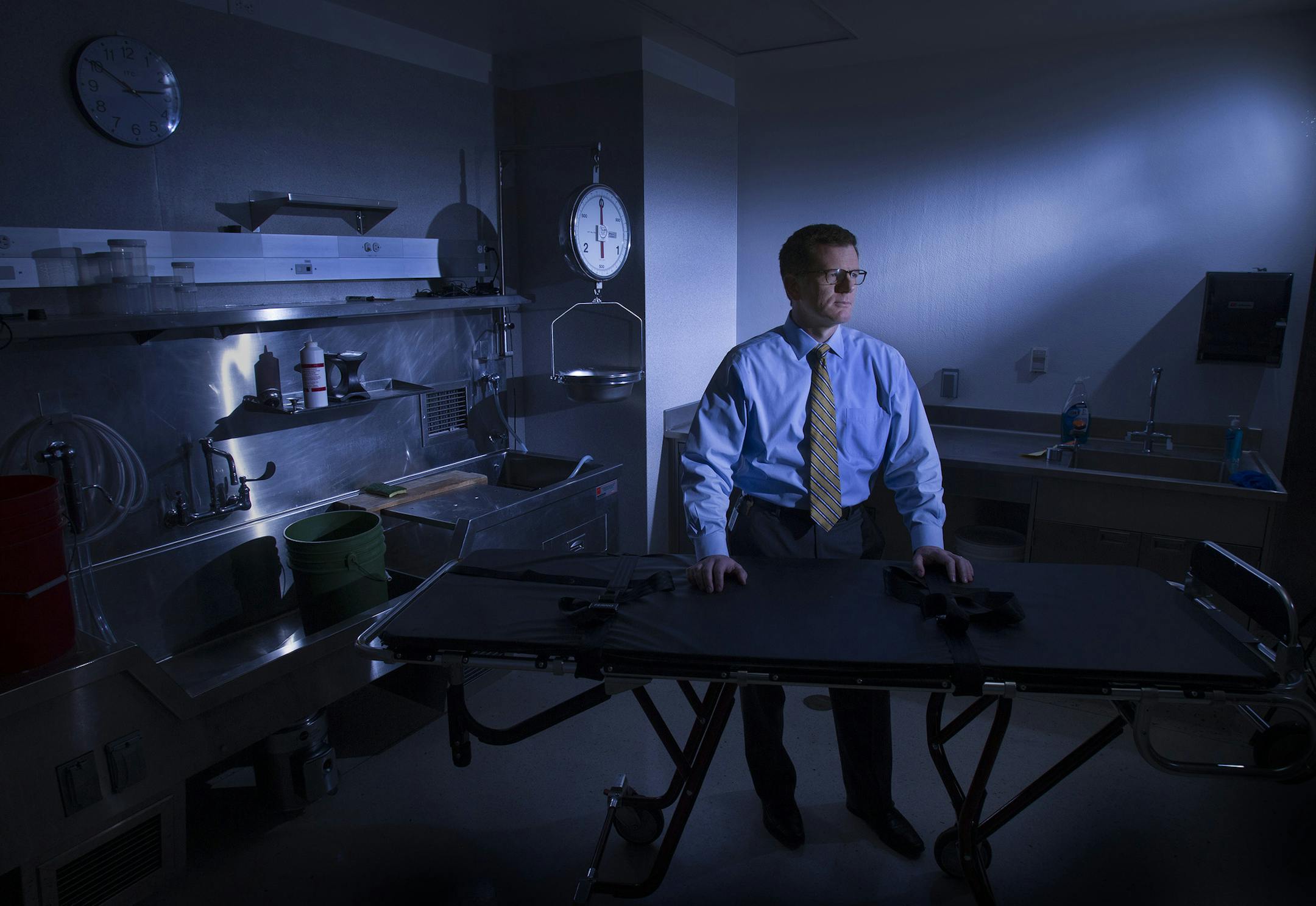 Jonathan Lucas, chief deputy medical examiner with the San Diego County medical examiner's office,in an autopsy exam room where he's now collecting autopsy samples for genome sequencing to reveal causes for some unexplained deaths, on December 8, 2014. (Allen J. Schaben/Los Angeles Times/TNS)